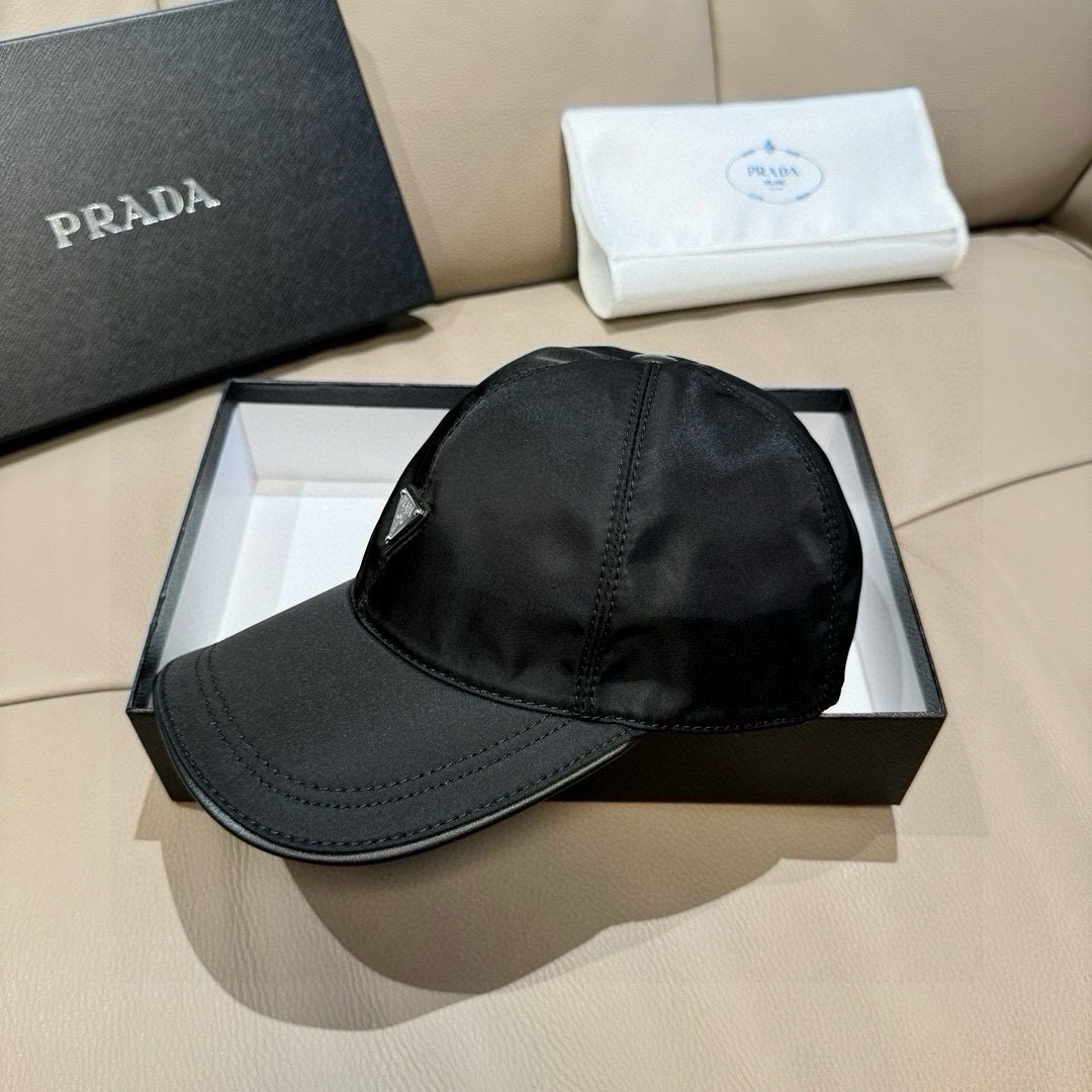 Prada Re-Nylon baseball cap in black with an enamel triangle logo