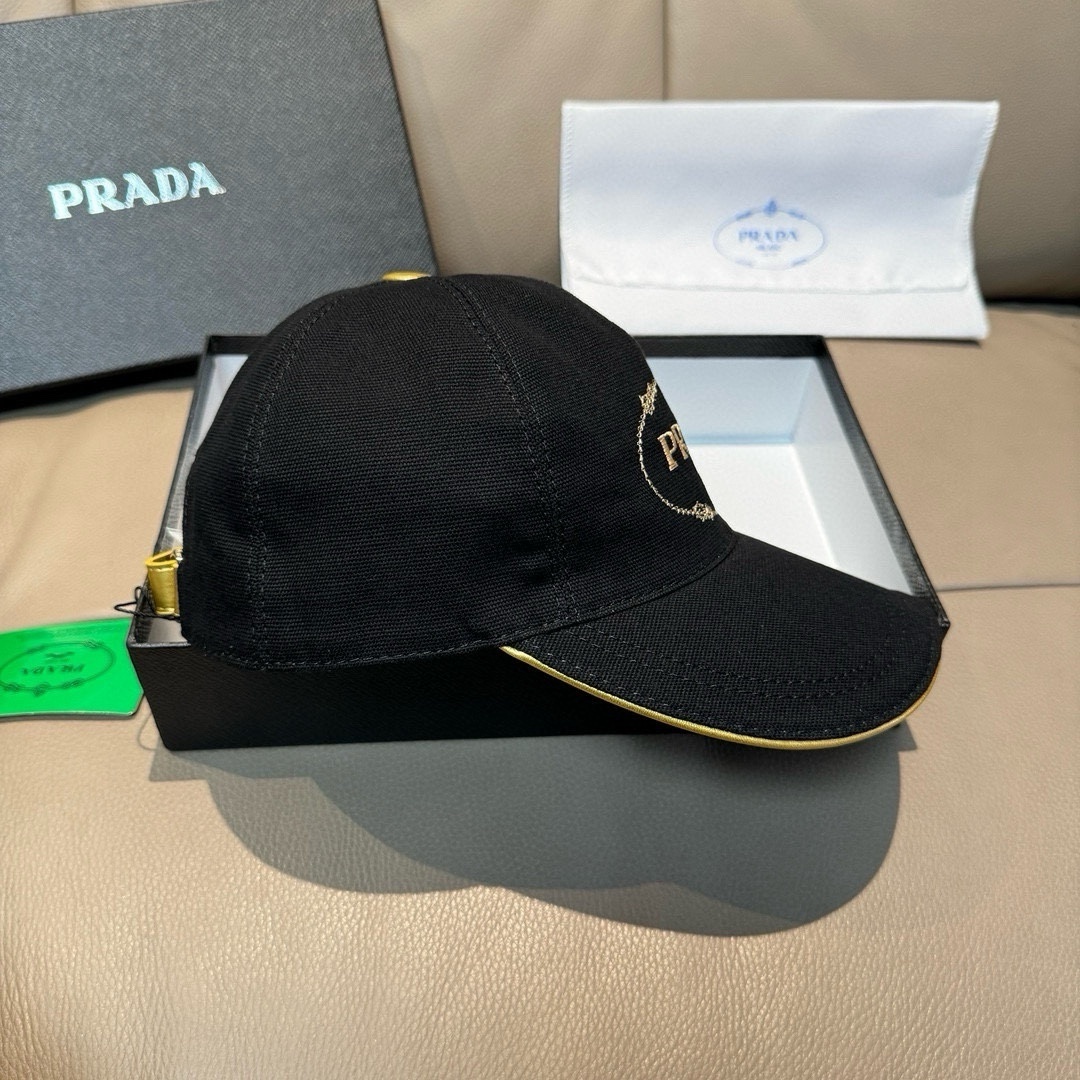 Prada Re-Nylon or tech fabric baseball cap in black with gold accents