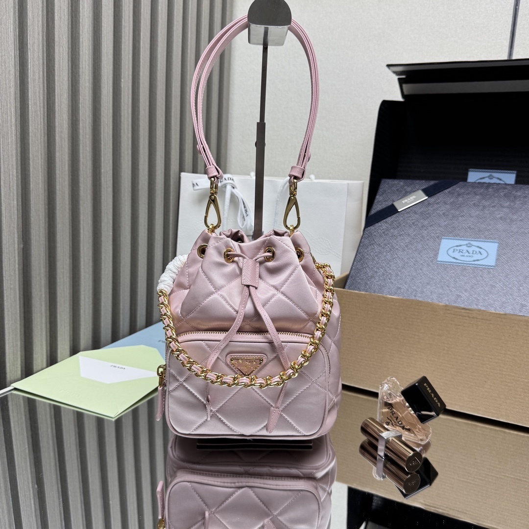 Prada Duet Re-Nylon bucket bag in light pink with gold-tone hardware