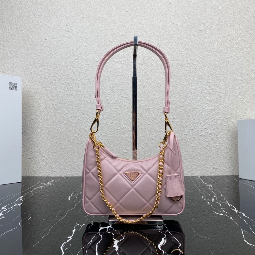 Prada Re-Edition 1995 Chaine Re-Nylon mini bag in begonia pink