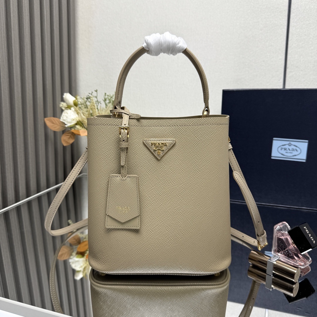 Prada Panier small Saffiano leather bucket bag in a beige or sand color