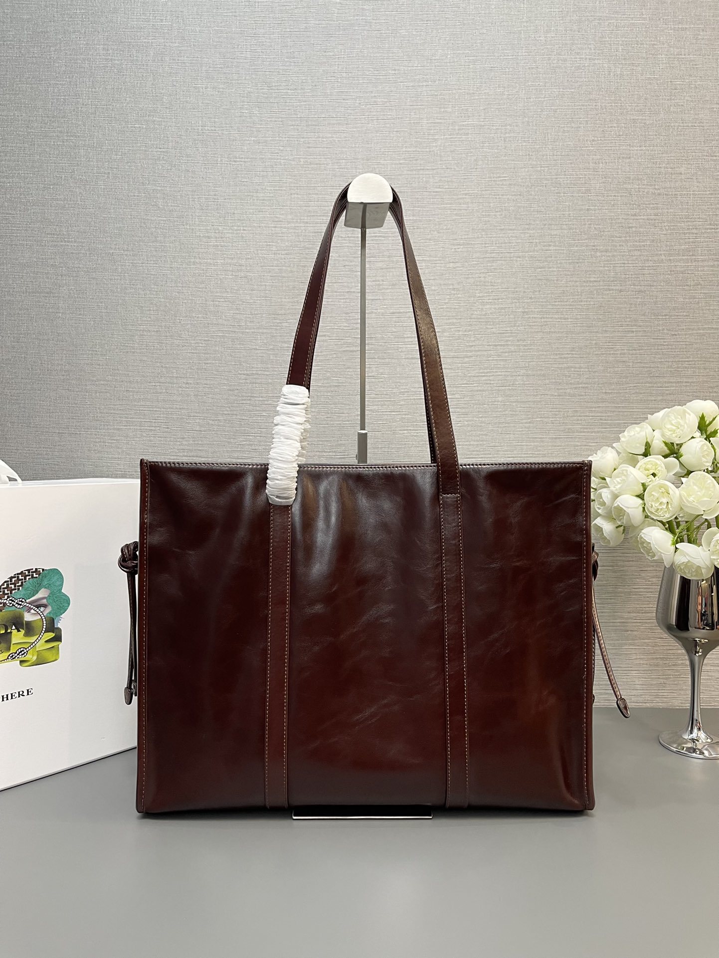 Prada large leather hobo tote bag with an adjustable crossbody strap