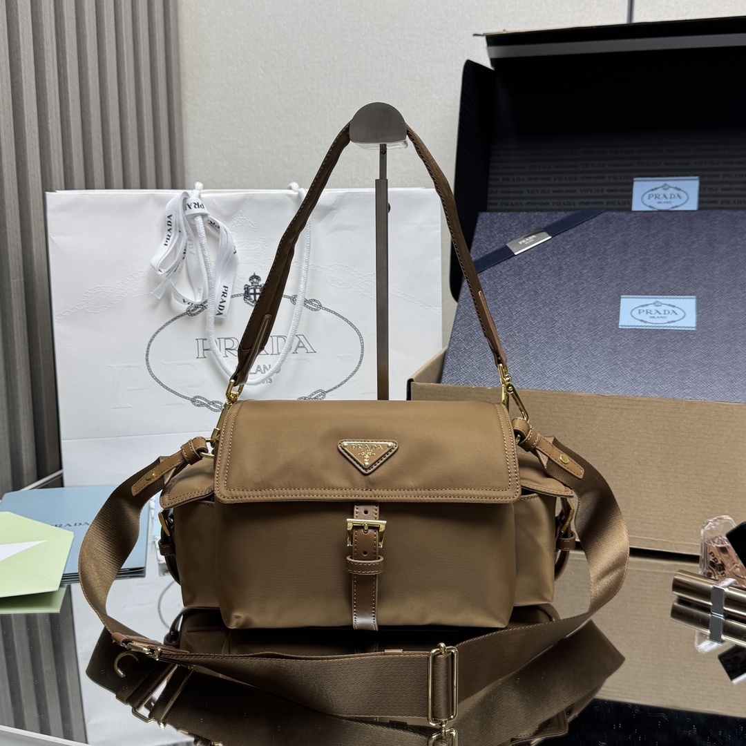 Prada Explore medium Re-Nylon shoulder bag in a brown (cinnamon/cognac) color