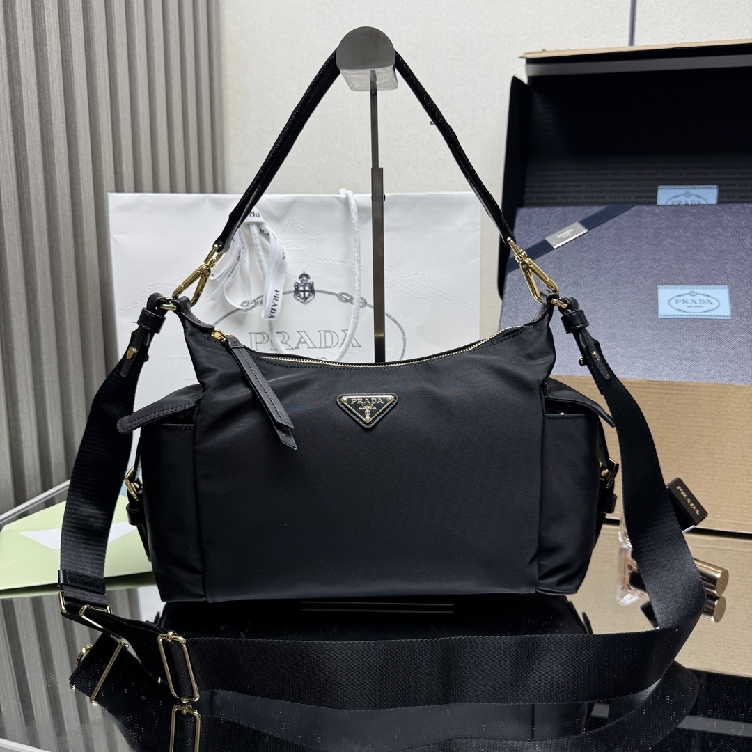 Prada Explore large Re-Nylon shoulder bag with a padded handle and detachable adjustable shoulder strap