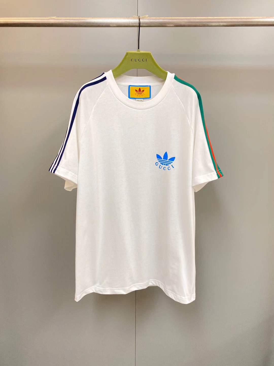 Gucci x Adidas Trefoil Print T-shirt in off-white.