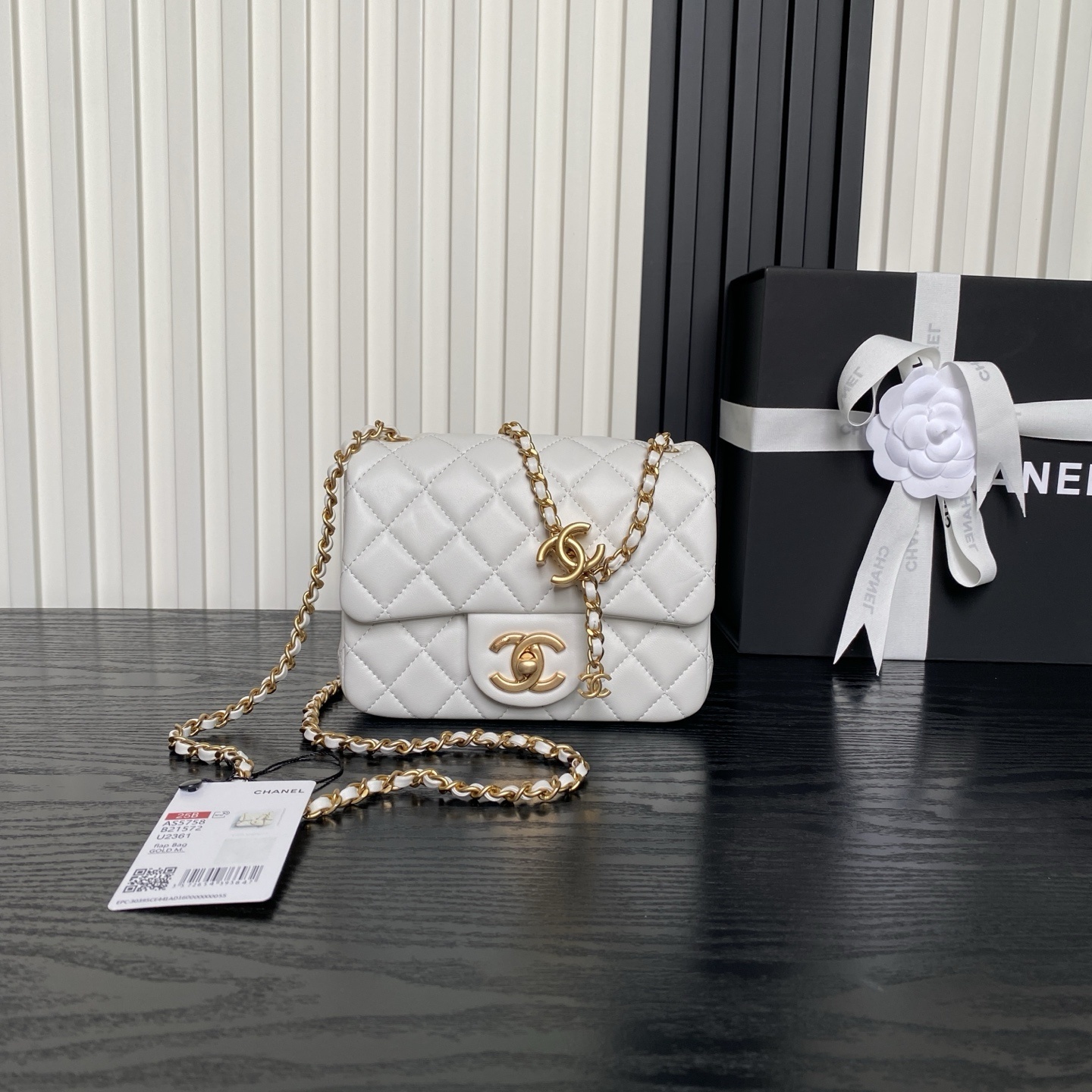 Chanel mini quilted caviar single flap bag in white