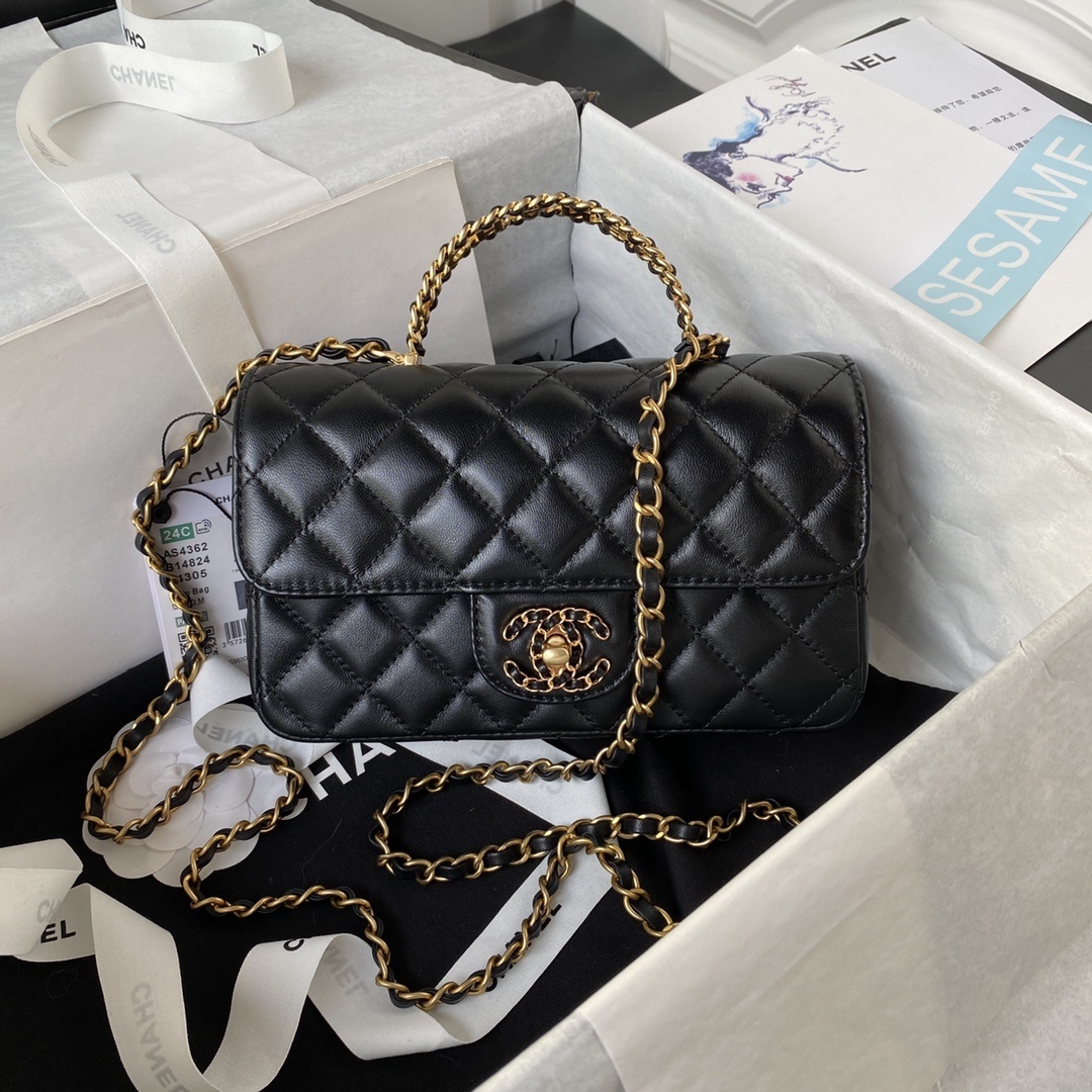 Chanel mini flap bag with a top handle