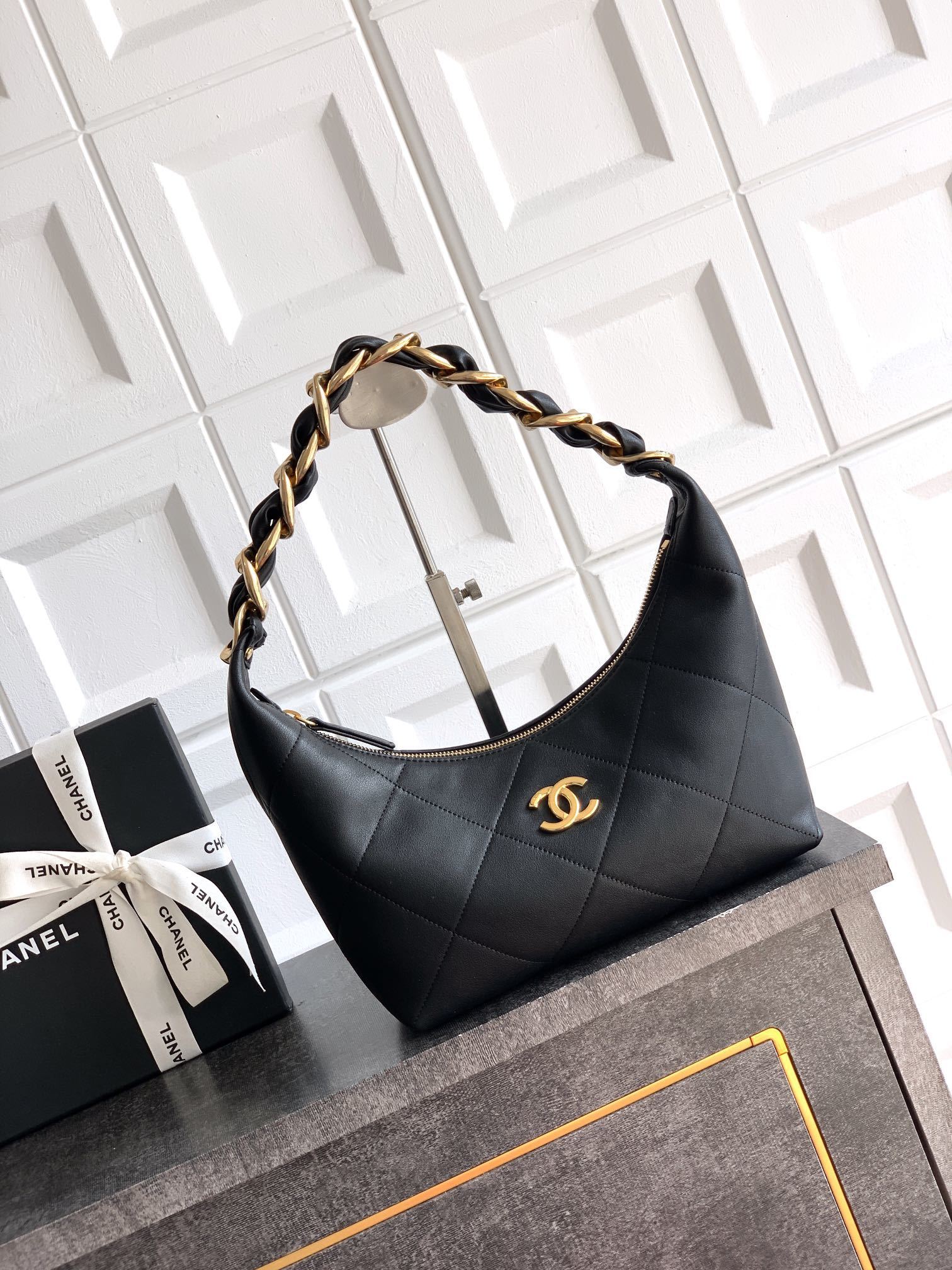 Chanel 25 small handbag in black grained calfskin Leather