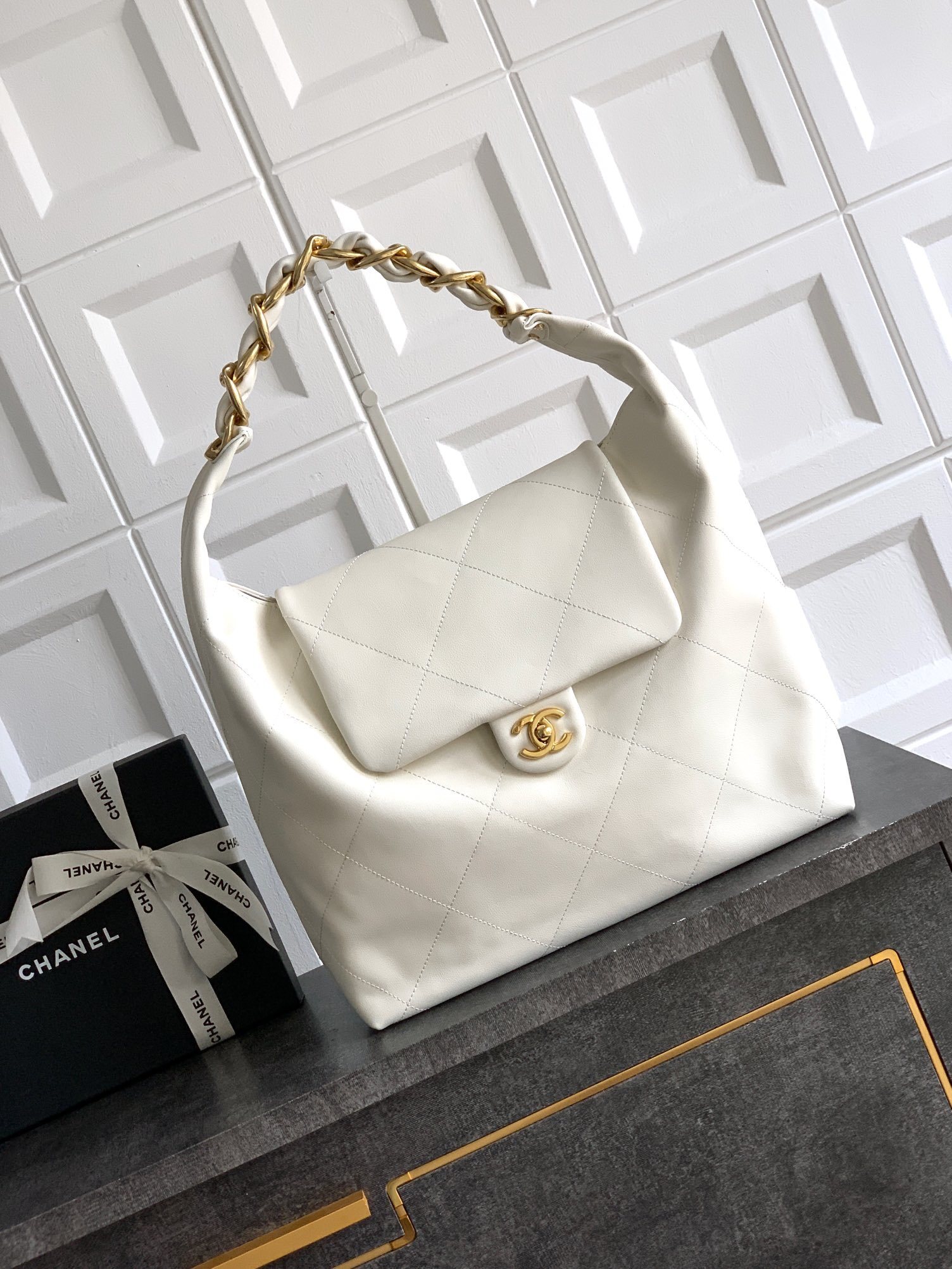 Chanel Maxi Hobo Bag in white shiny calfskin with gold-tone metal