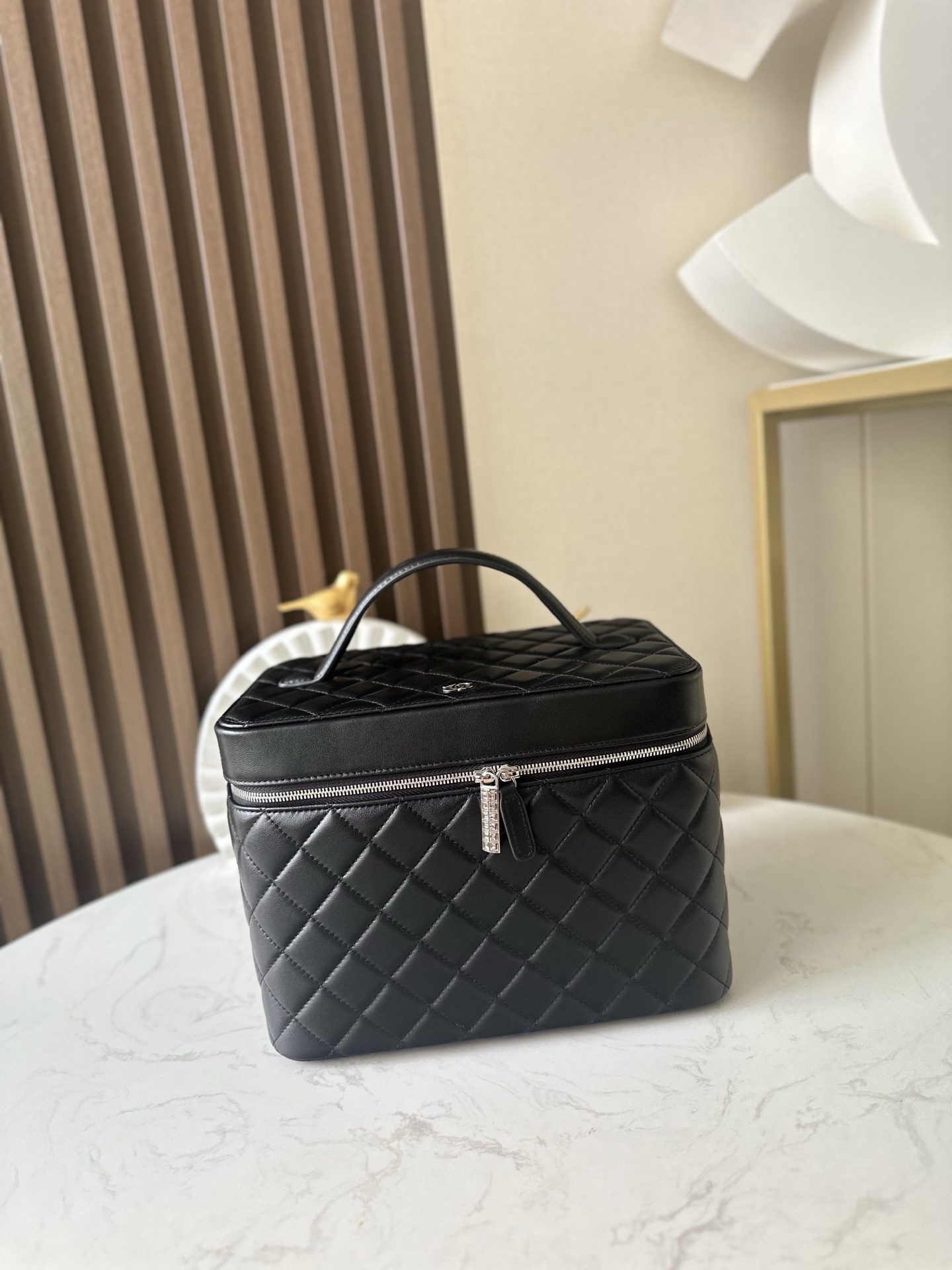 Chanel Classic Vanity Case in black quilted caviar leather