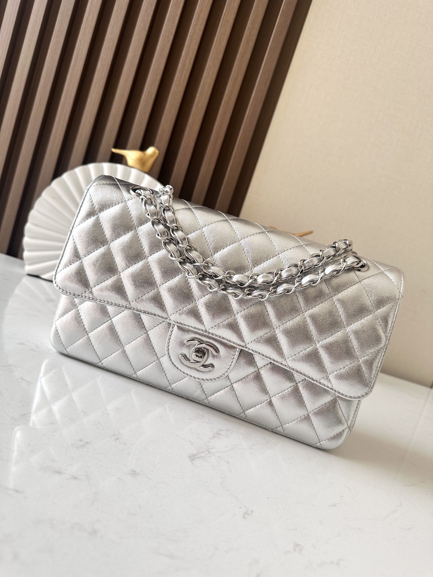 Chanel Medium Classic Double Flap Bag in metallic silver quilted lambskin leather with silver-tone hardware