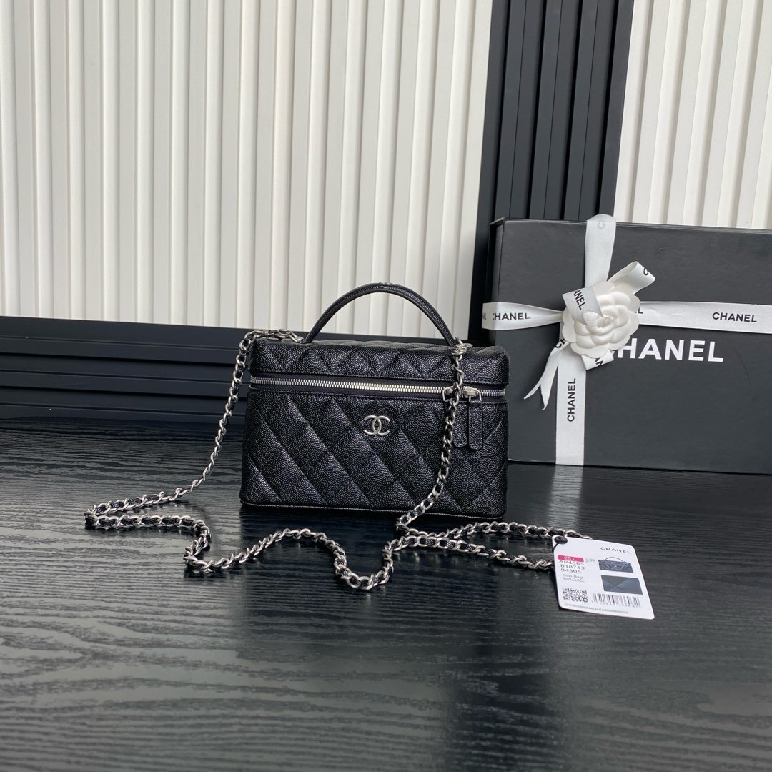 Chanel 25C vanity bag in caviar leather with a top handle and silver-tone metal chain