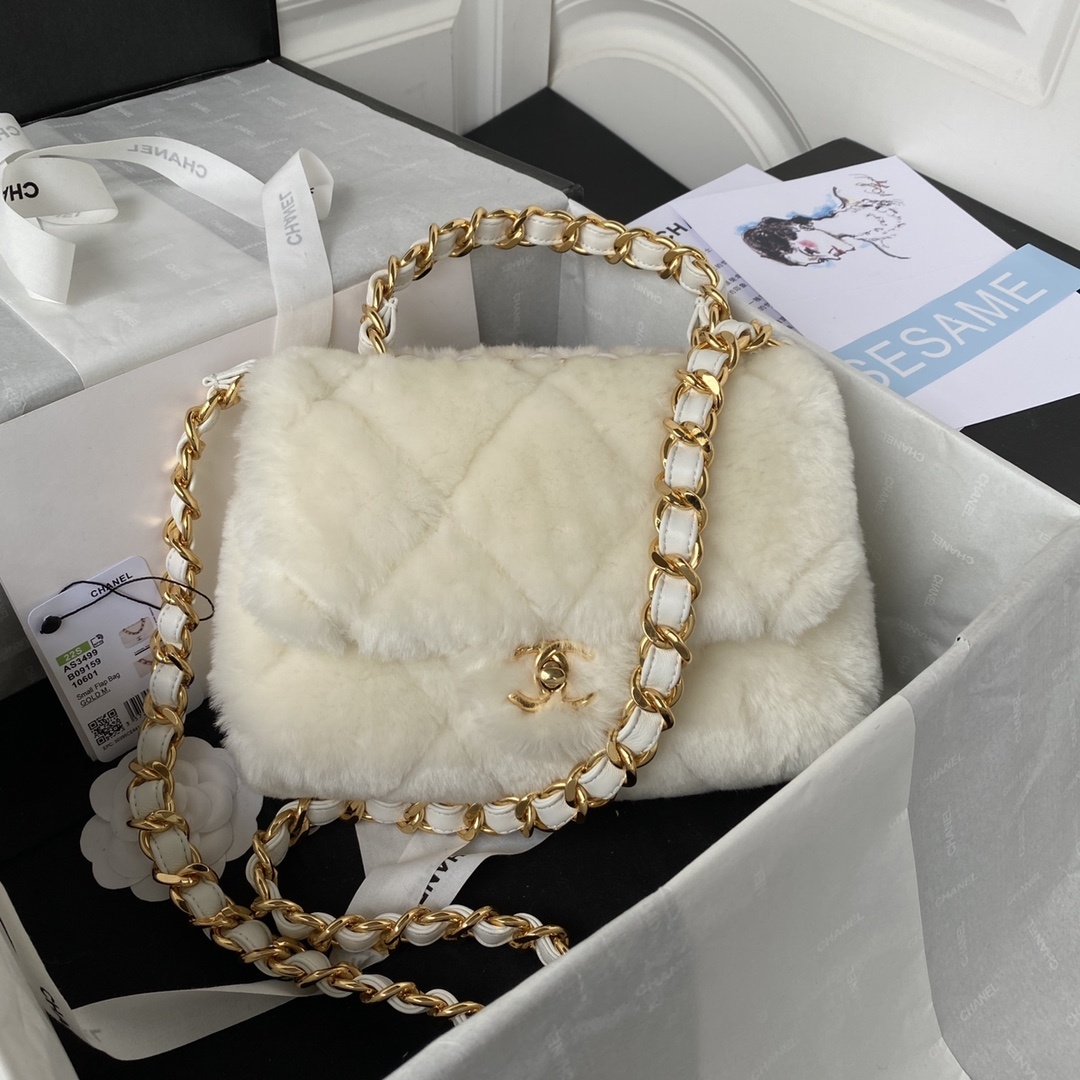 Chanel shearling lambskin flap bag in white with gold-tone hardware