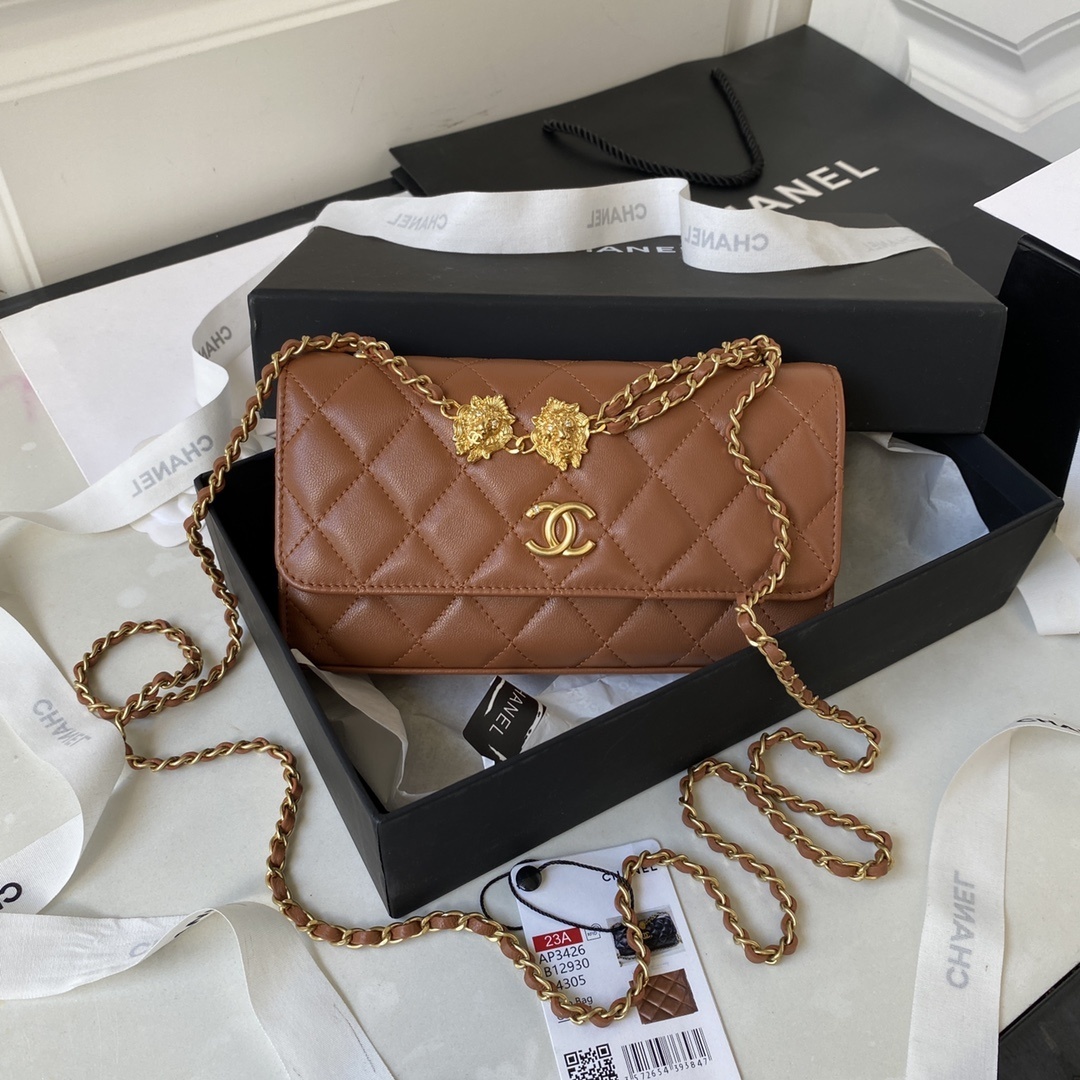 Chanel Flap Phone Holder with Chain in a brown leather bag with gold-tone hardware and a CC logo