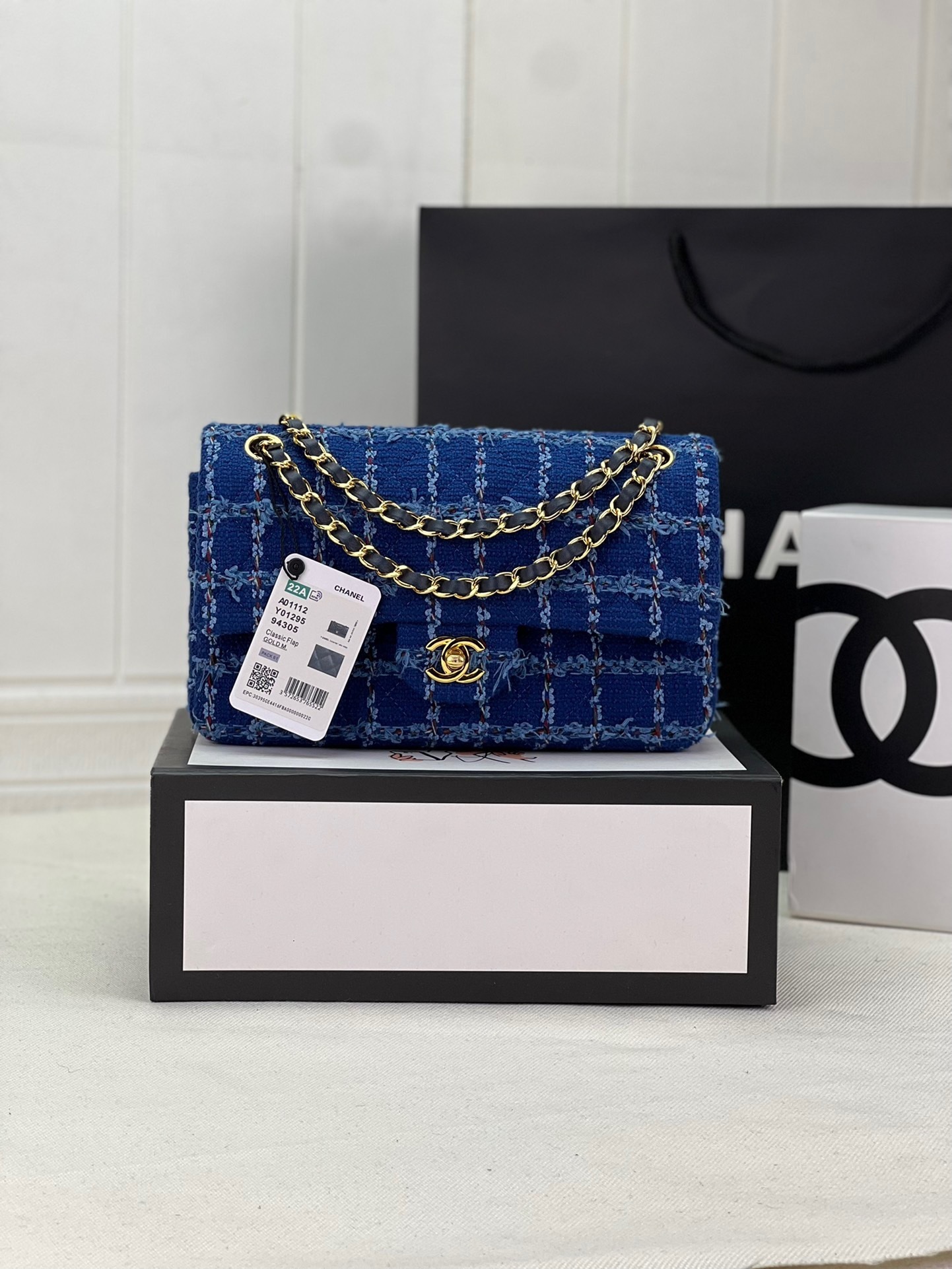 Chanel Classic Flap bag in blue tweed with gold-tone hardware