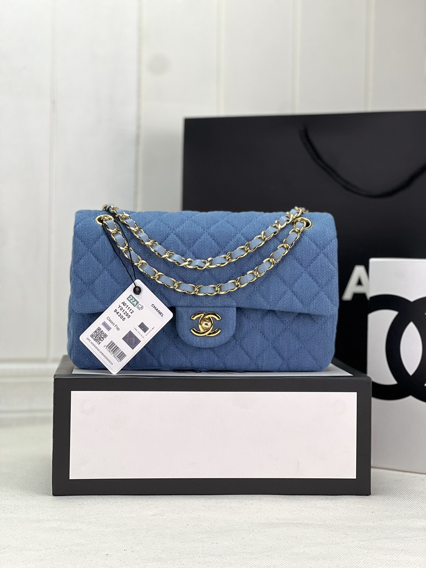 Chanel Classic Flap shoulder bag light blue in quilted denim with light gold-tone hardware