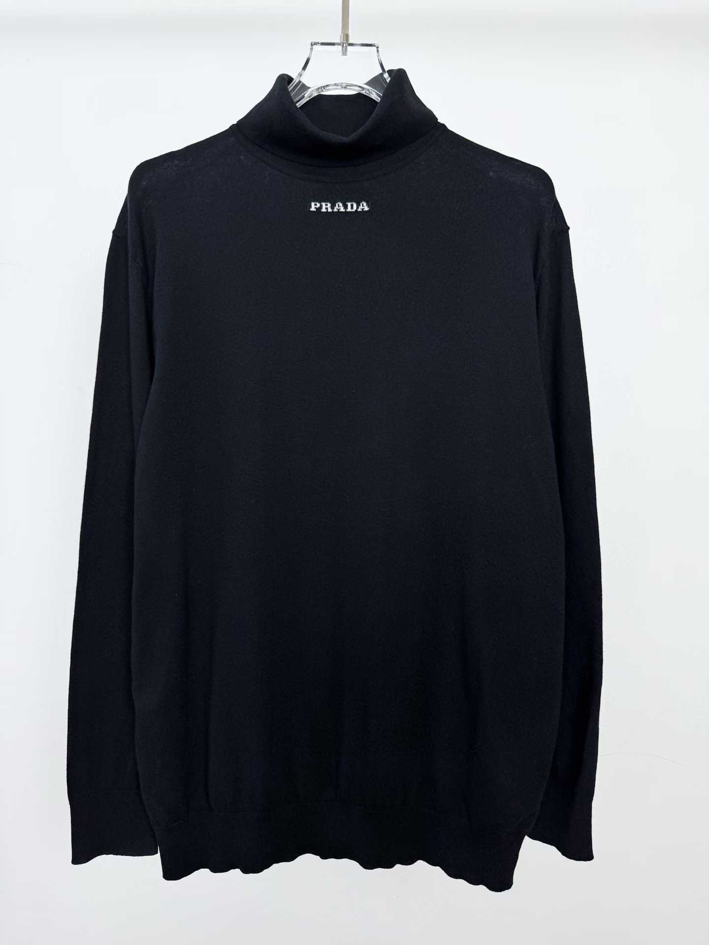 Prada superfine wool turtleneck sweater in black with an embroidered logo