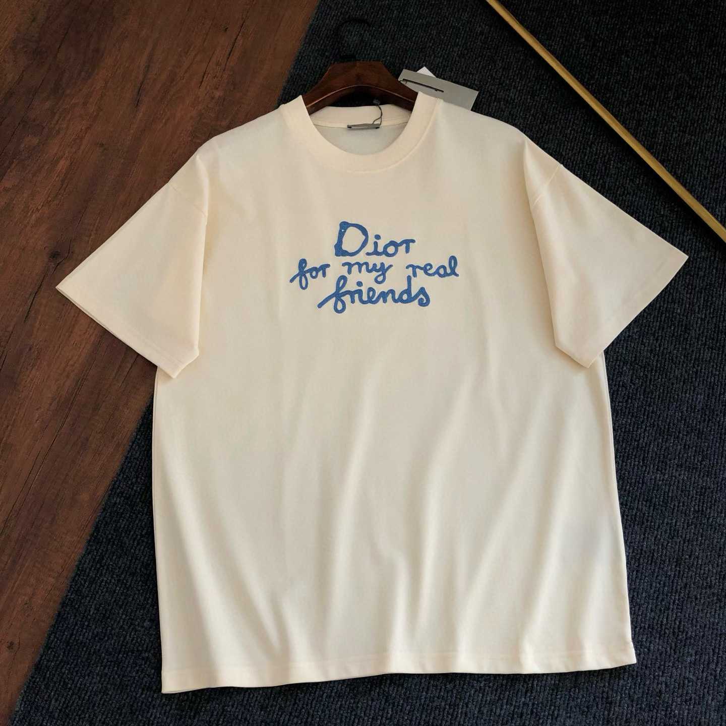 Dior and Hylton Nel T-shirt in white cotton jersey with the "Dior for my real friends" signature embroidery on the chest