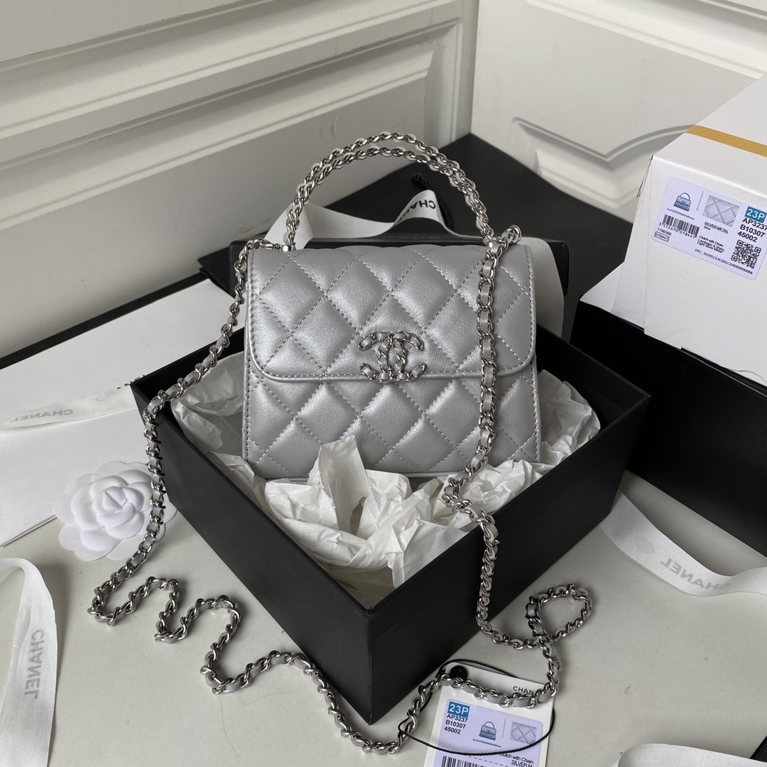 Chanel mini flap bag with top handle in metallic lambskin leather and silver-tone hardware