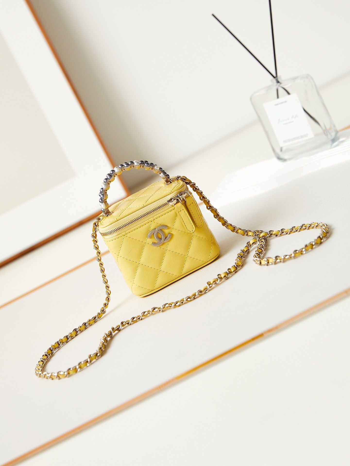 Chanel vanity case in yellow