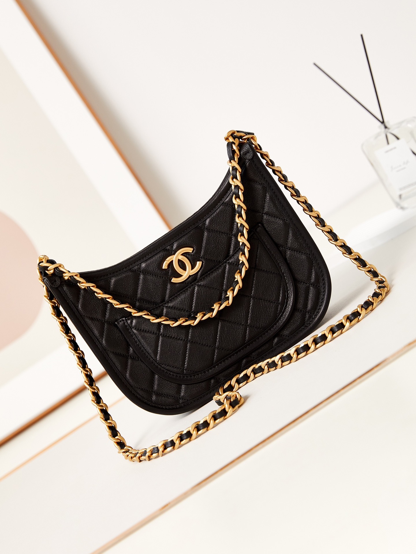 Chanel hobo bag in quilted lambskin leather with gold-tone hardware