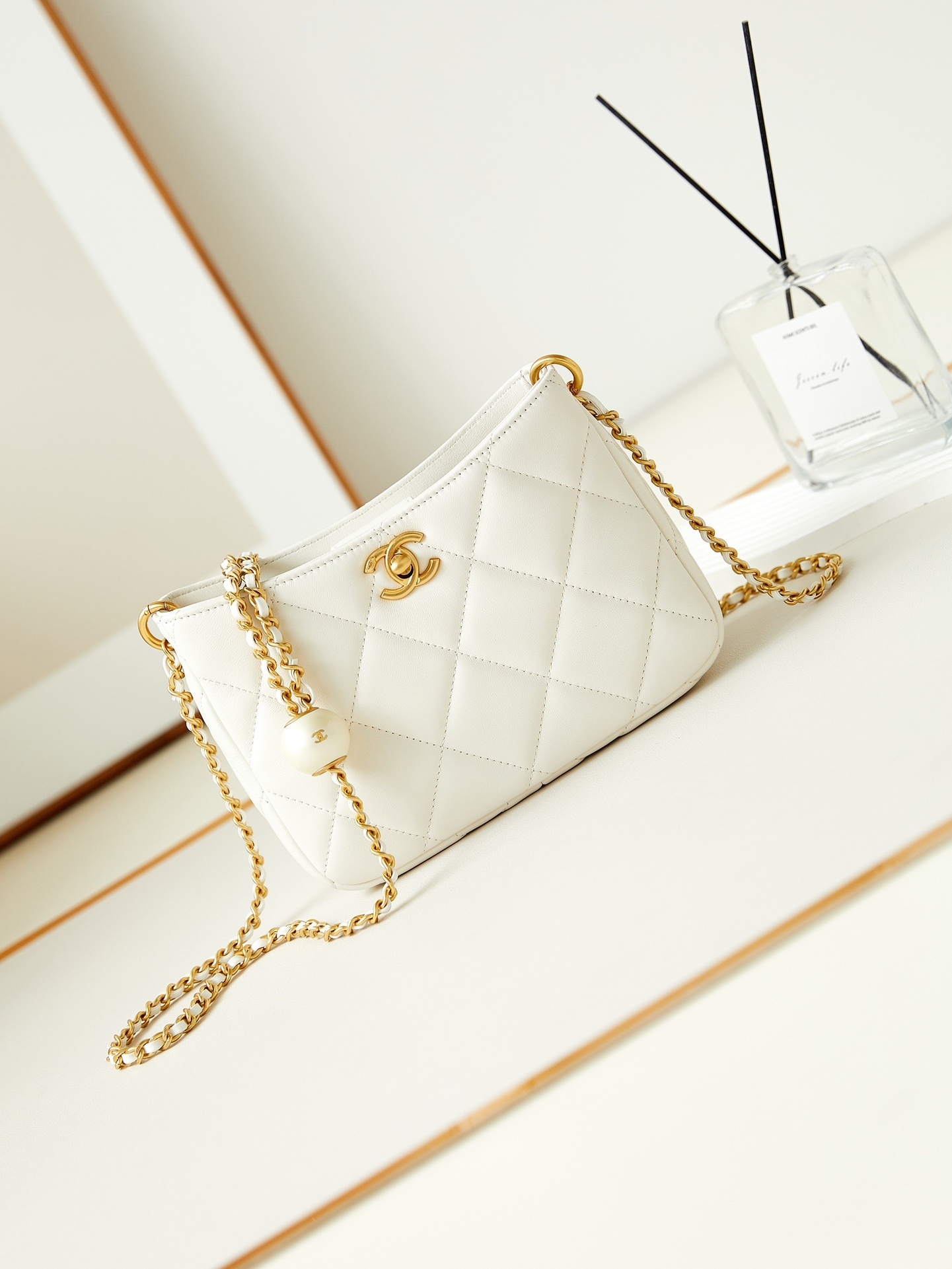 Chanel matelassé chain shoulder bag in lambskin with gold-tone hardware White