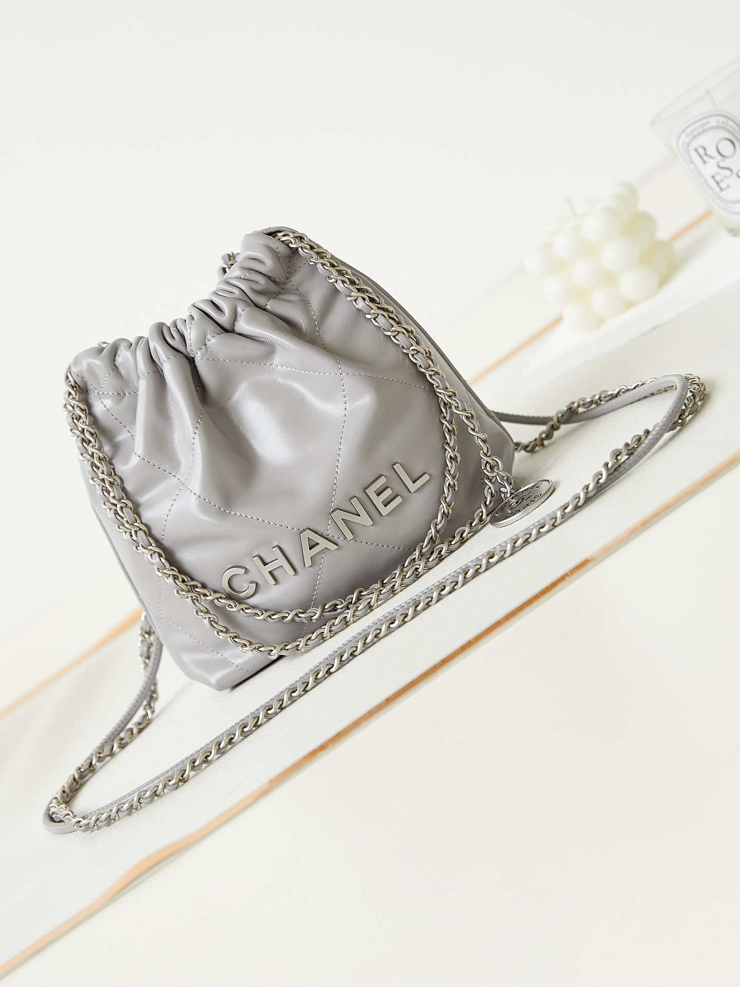 Chanel Mini 22 hobo bag in grey leather with silver-tone hardware