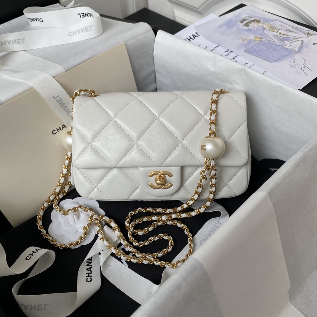 Chanel Mini Flap Bag in ecru shiny lambskin with imitation pearls