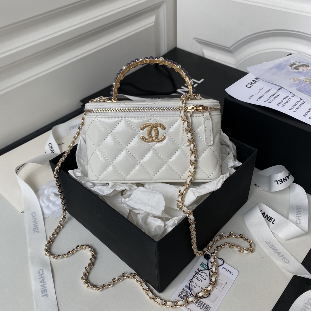 Chanel 23P Top Handle WOC (Wallet on Chain) in white caviar leather