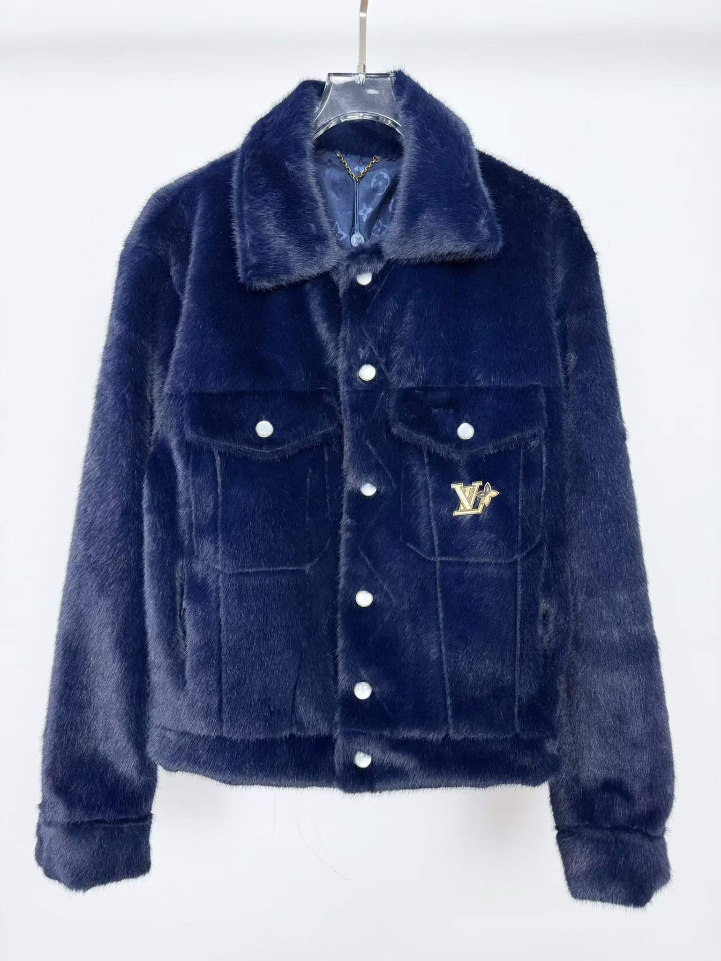 LV Mink Denim Trucker Jacket in indigo color.