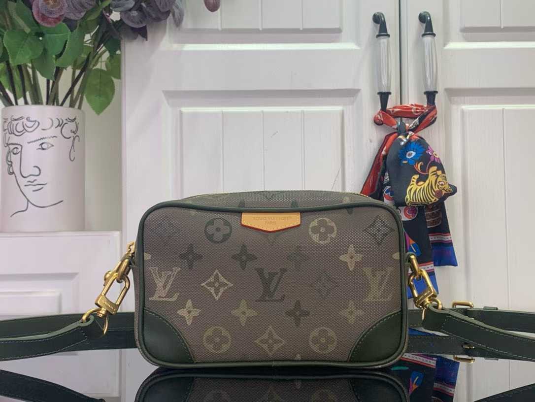 LV Trocadero Wearable Wallet in Monogram Heritage coated canvas with green leather trim.