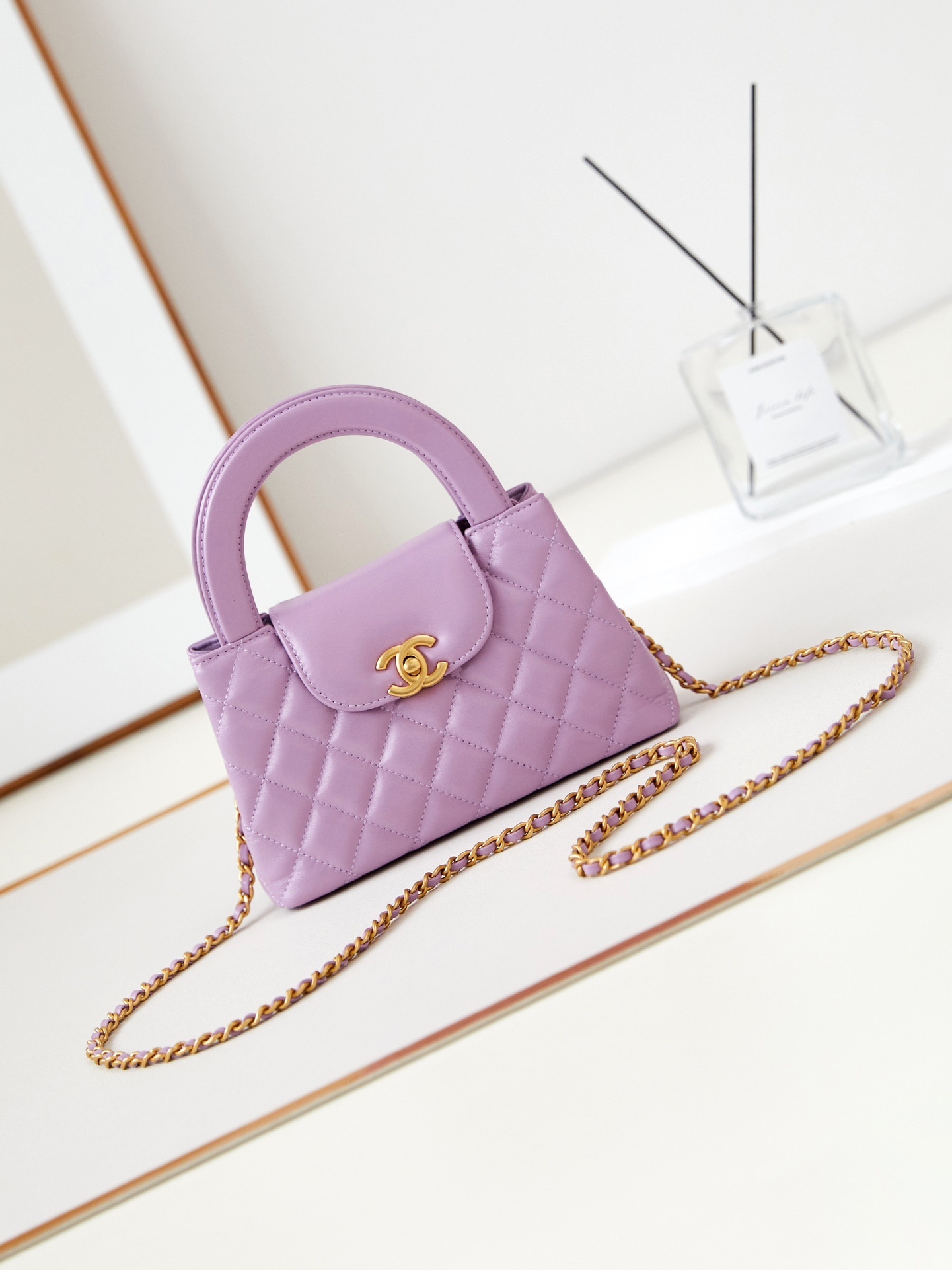 Chanel Mini Kelly diamond-quilted handbag in purple aged calf leather