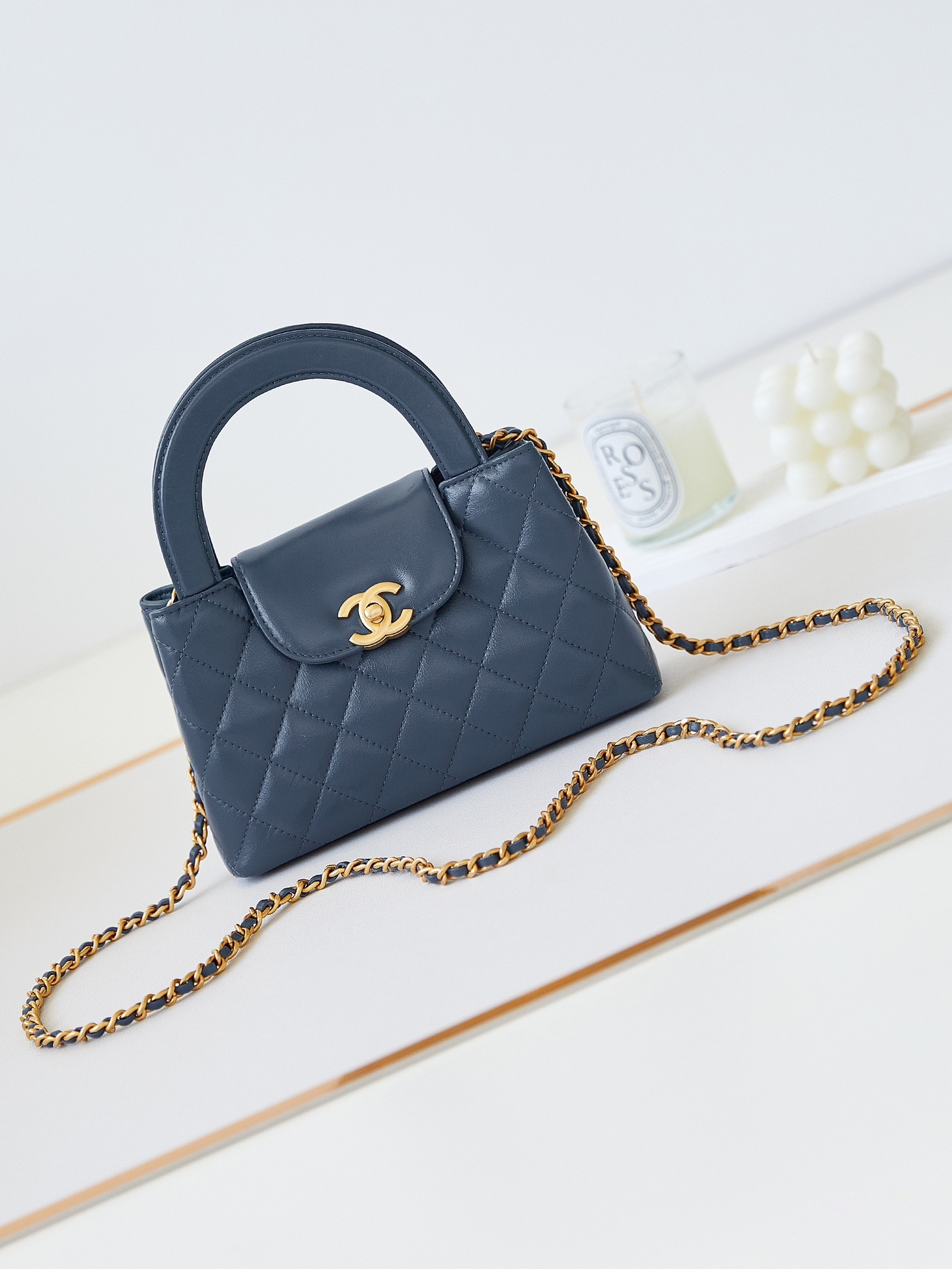 Chanel Kelly mini bag with a top handle calfskin leather