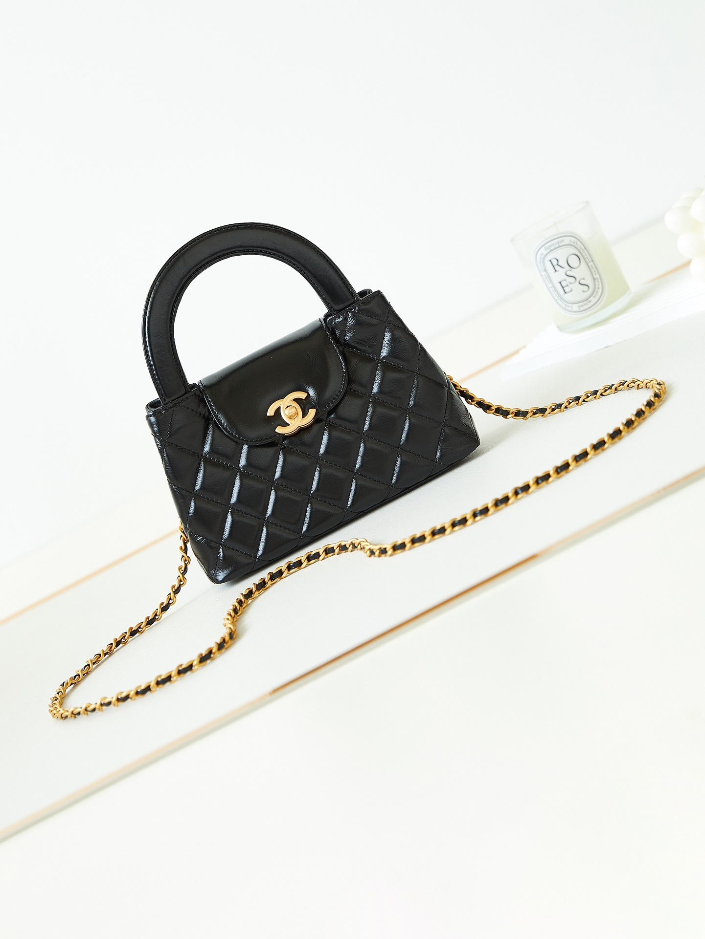Chanel Mini Kelly bag in black quilted aged calfskin leather with gold-tone hardware