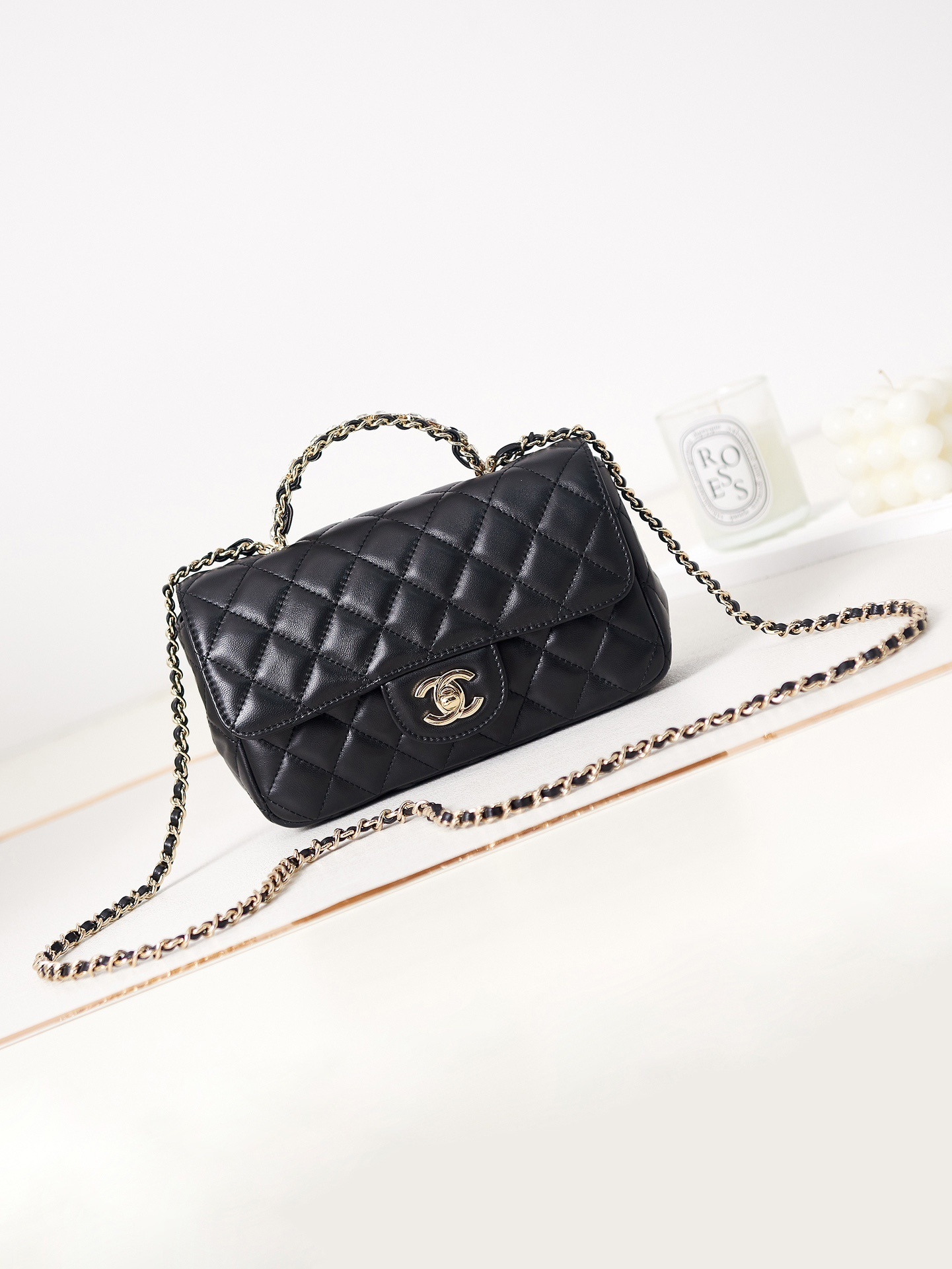 Chanel Mini Flap Bag with Top Handle in black leather