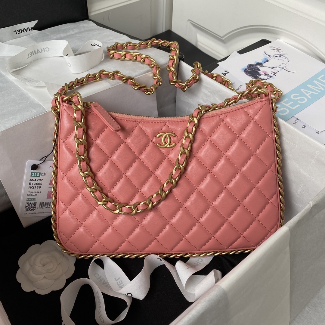 Chanel CC Chain Around Hobo bag in quilted lambskin leather and a coral hue