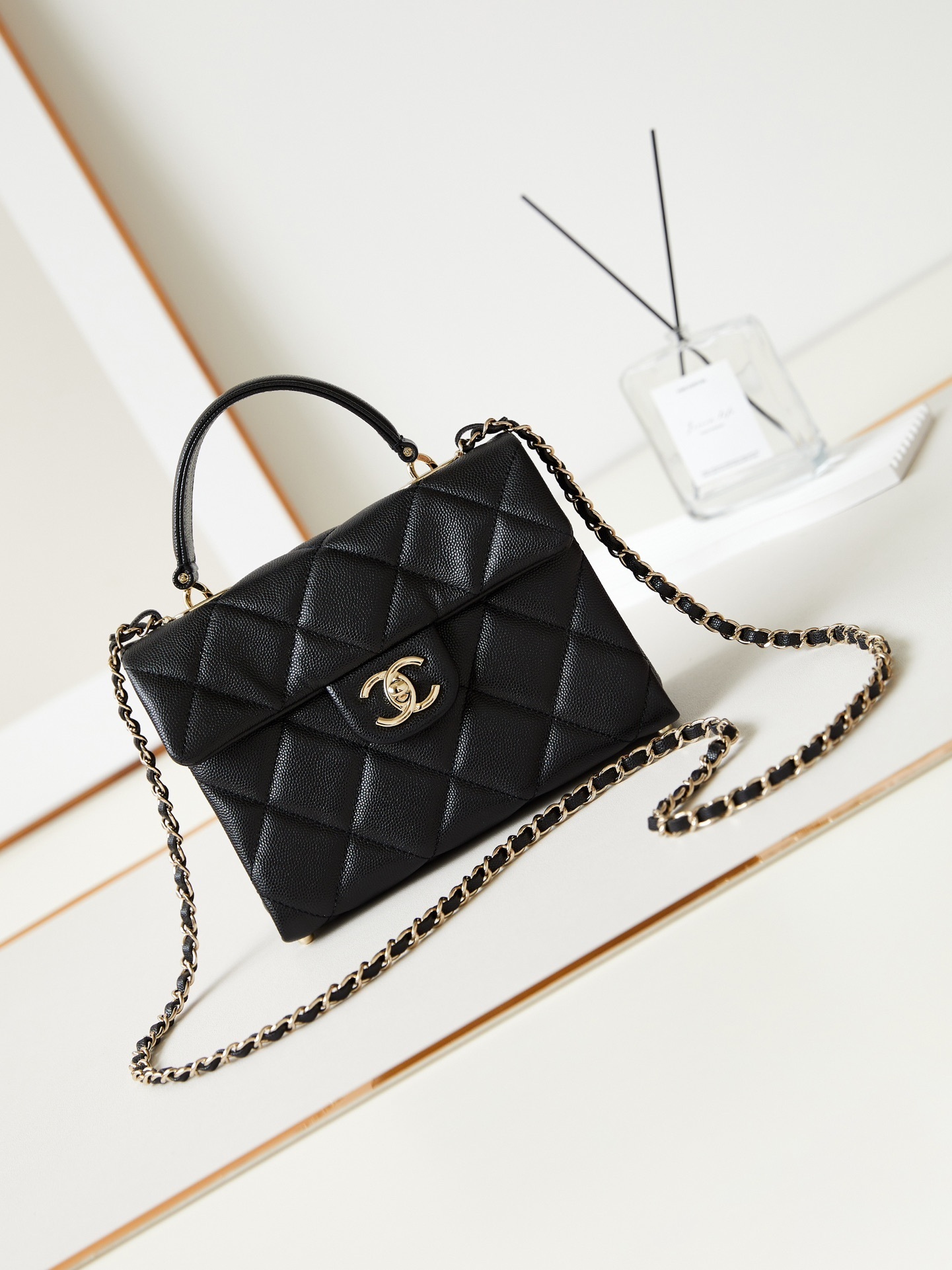 Chanel black quilted caviar medium Coco top handle flap bag