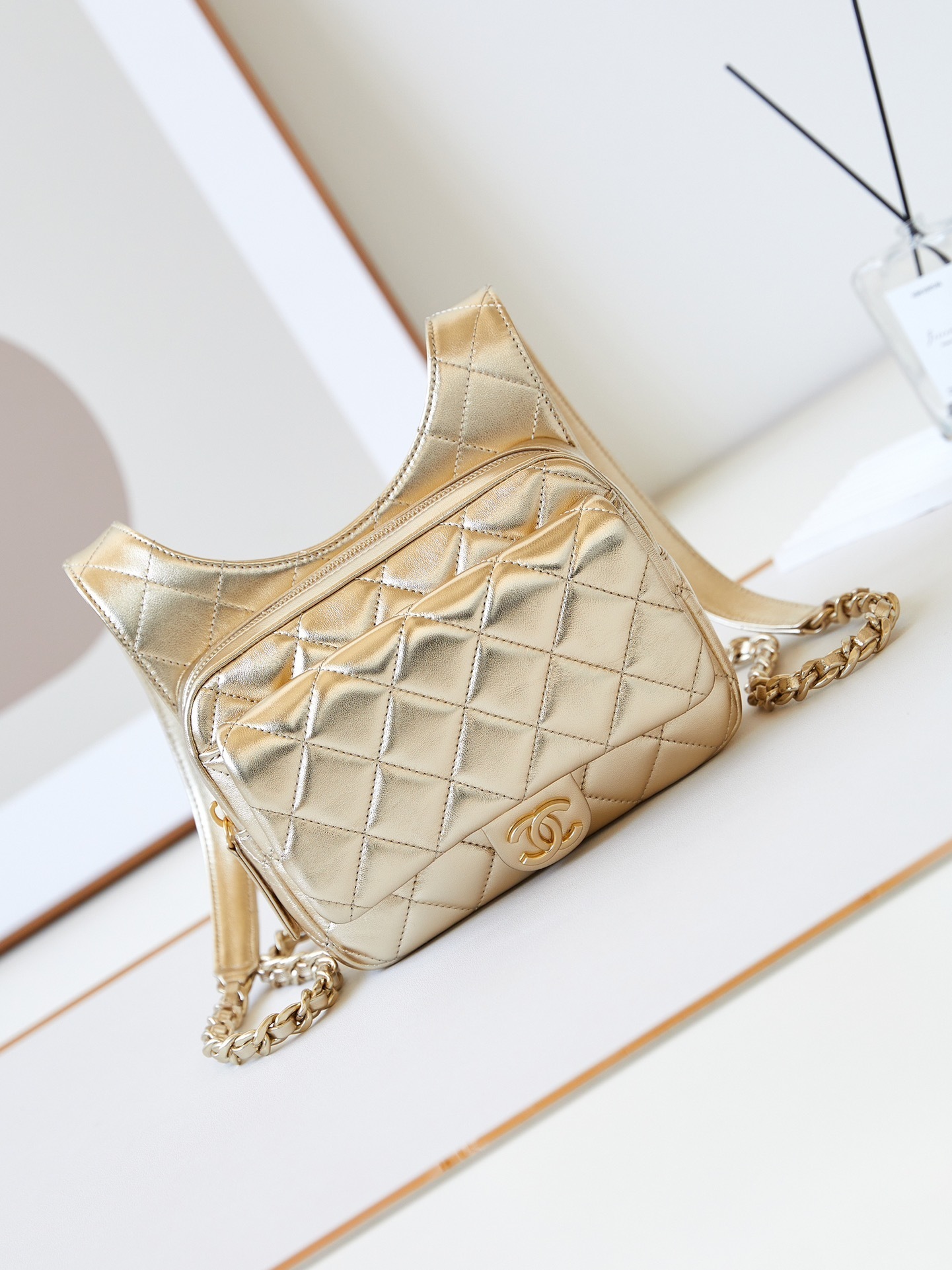 Chanel 24C mini backpack in quilted mirror metallic gold calfskin