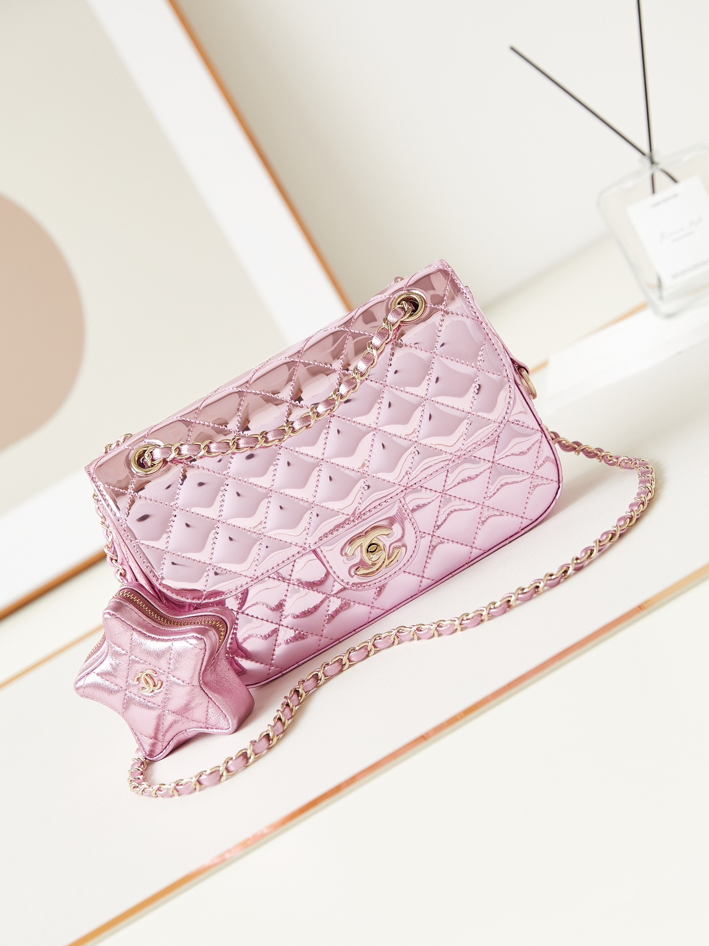 Chanel Mini Flap Bag and Star Coin Purse set from the 24C collection in pink mirror calfskin leather