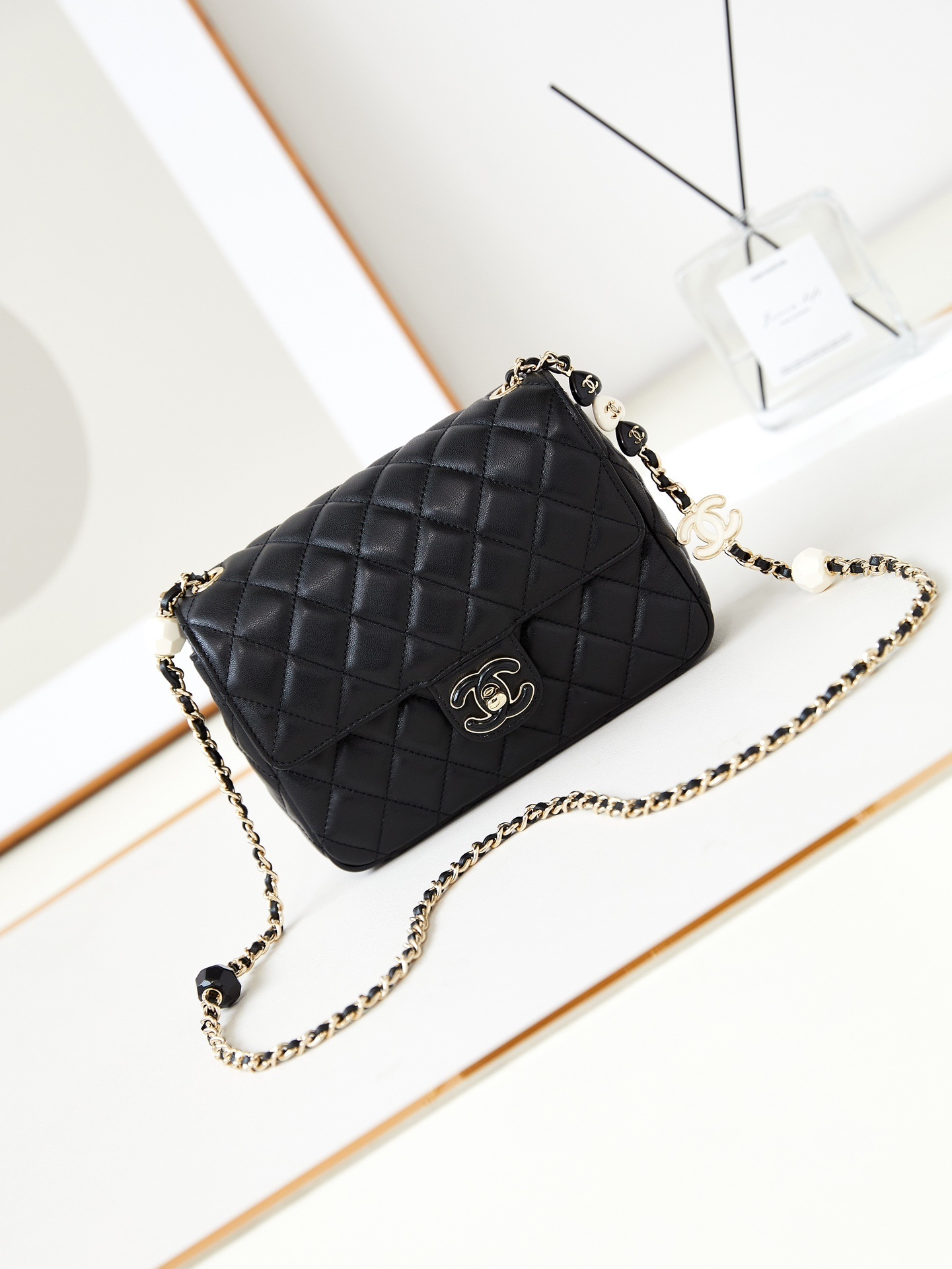 Chanel Mini Classic Flap bag in black lambskin leather