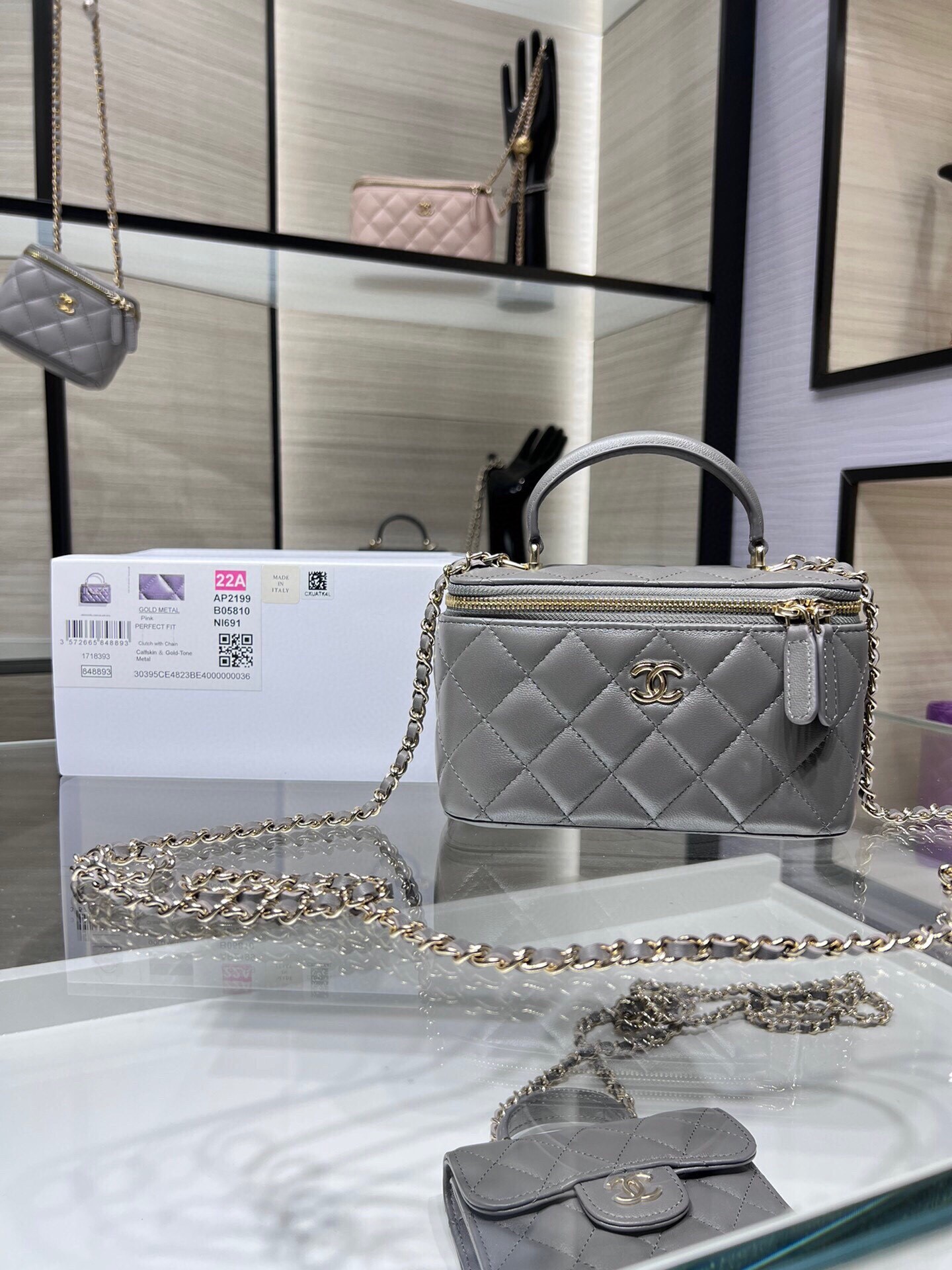 Chanel small vanity top handle bag in gray quilted leather