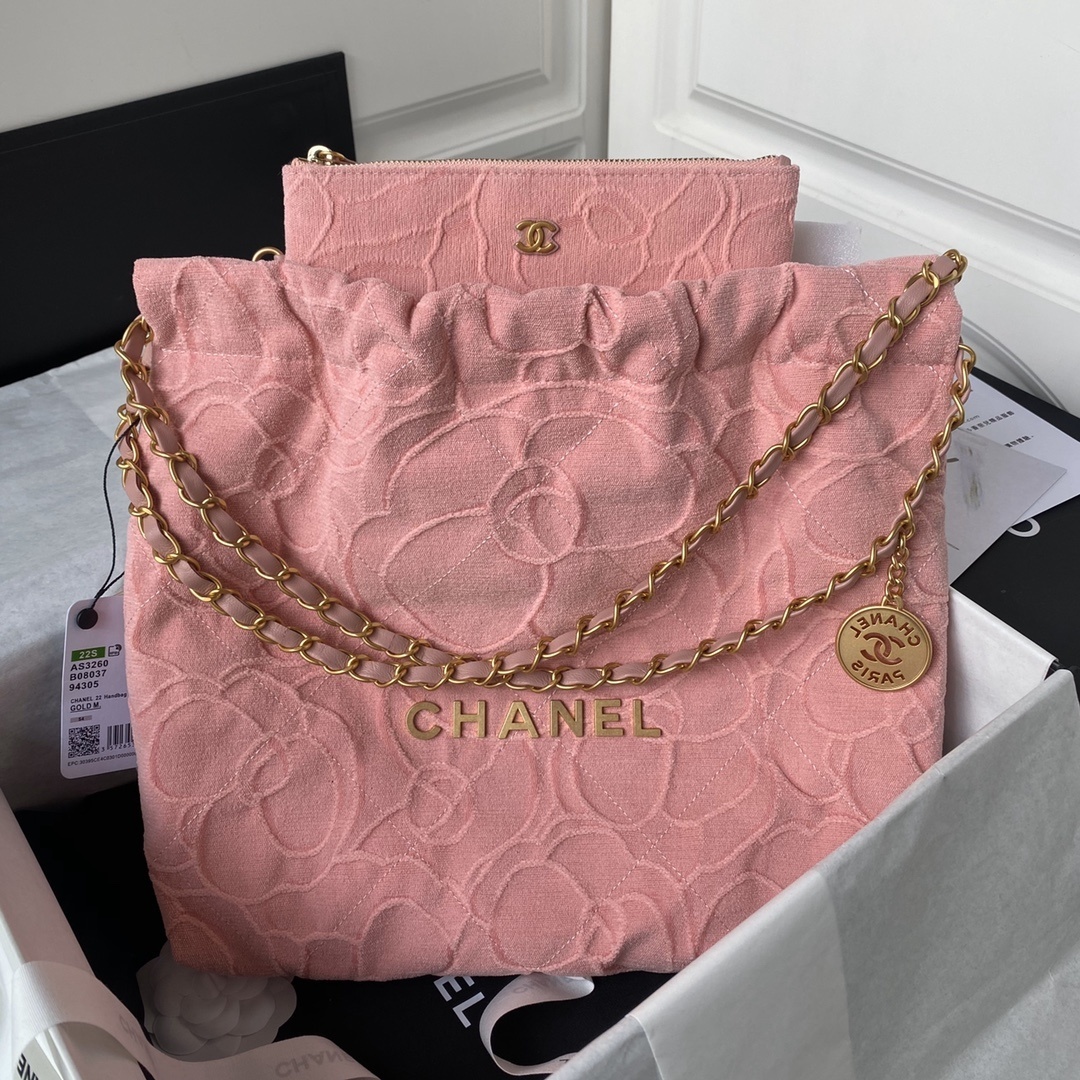Chanel 22 Small Handbag in pink denim with gold-tone metal hardware