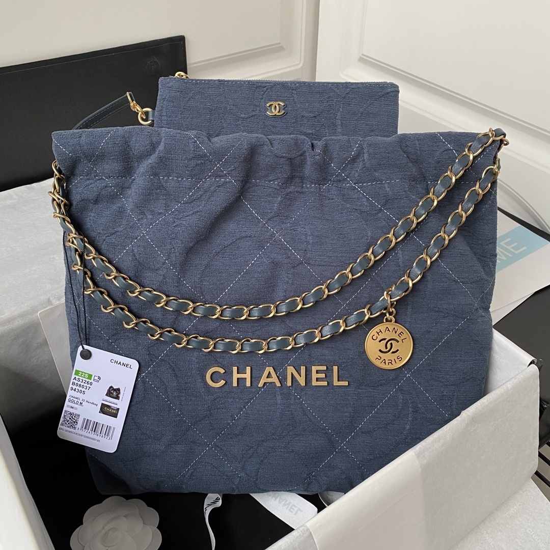 Chanel 22 bag in washed denim with gold-tone metal hardware