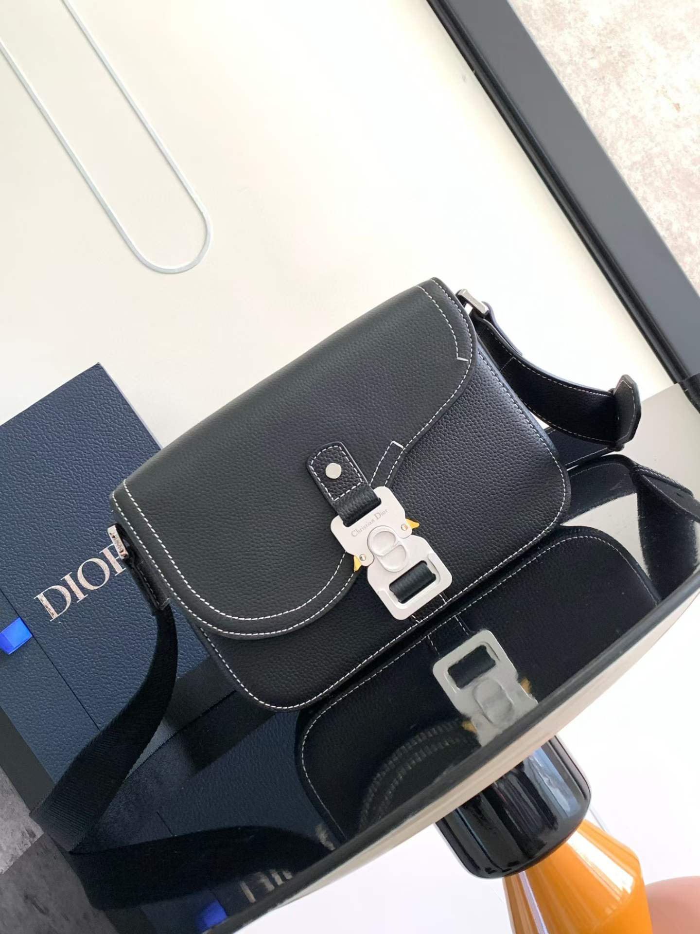 Dior Mini Saddle Bag with Strap in black grained calfskin with contrasting topstitching