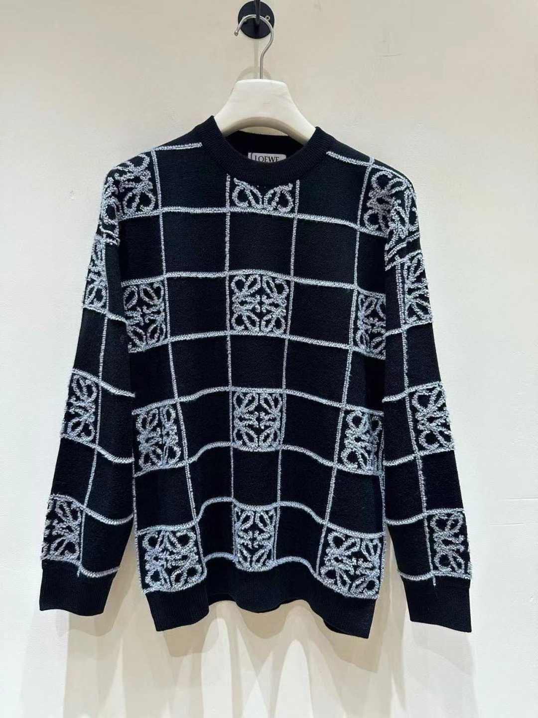 loewe black and white checked sweater with a repeating logo pattern
