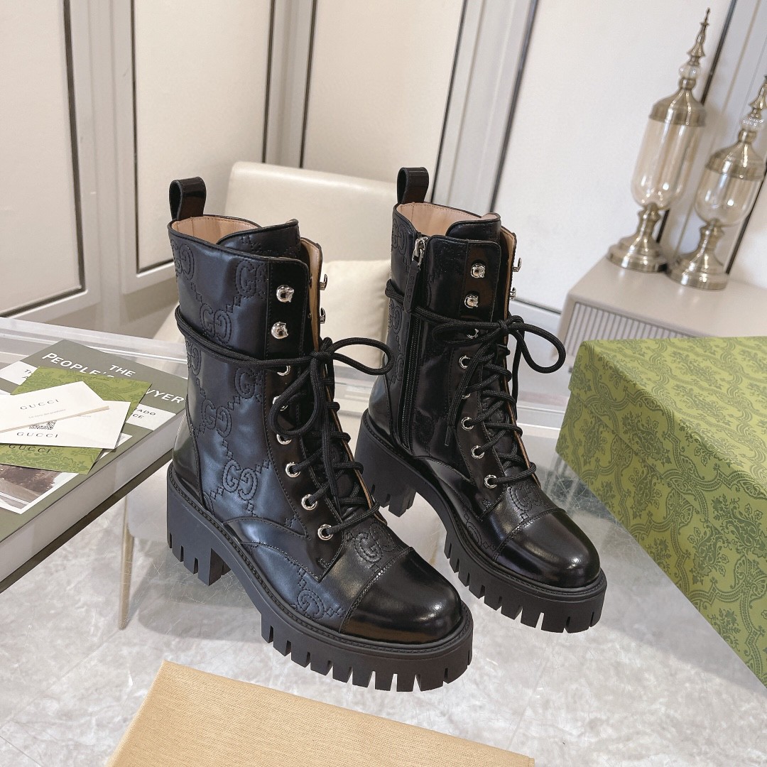 Gucci GG Matelassé lace-up platform combat boots in black leather