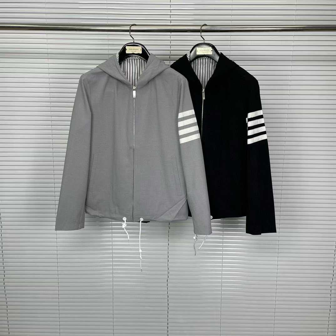 Thom Browne 4-Bar stripe hooded jacket in grey and black ripstop nylon