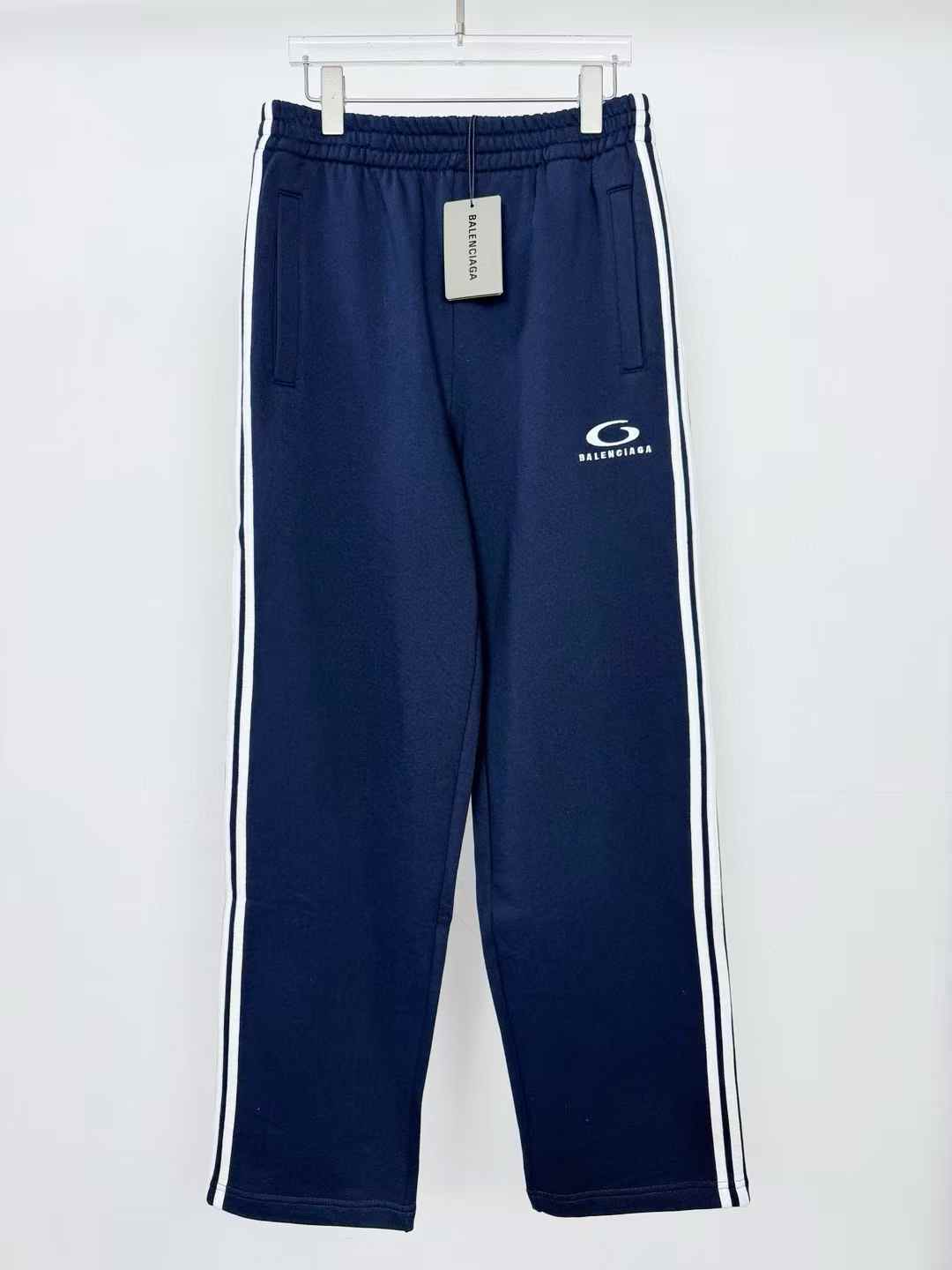 Balenciaga striped baggy track pants in washed navy
