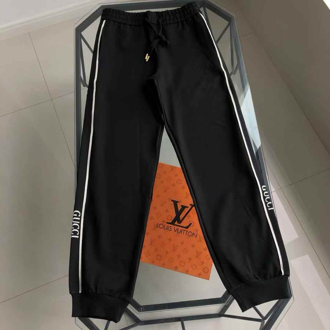 Gucci  jogging pants the Monogram Toweling Jogging Pants in black with white side stripes