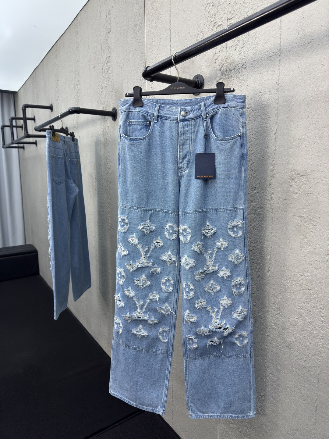 LV Denim Skate Jeans in indigo with a torn monogram on the double knees